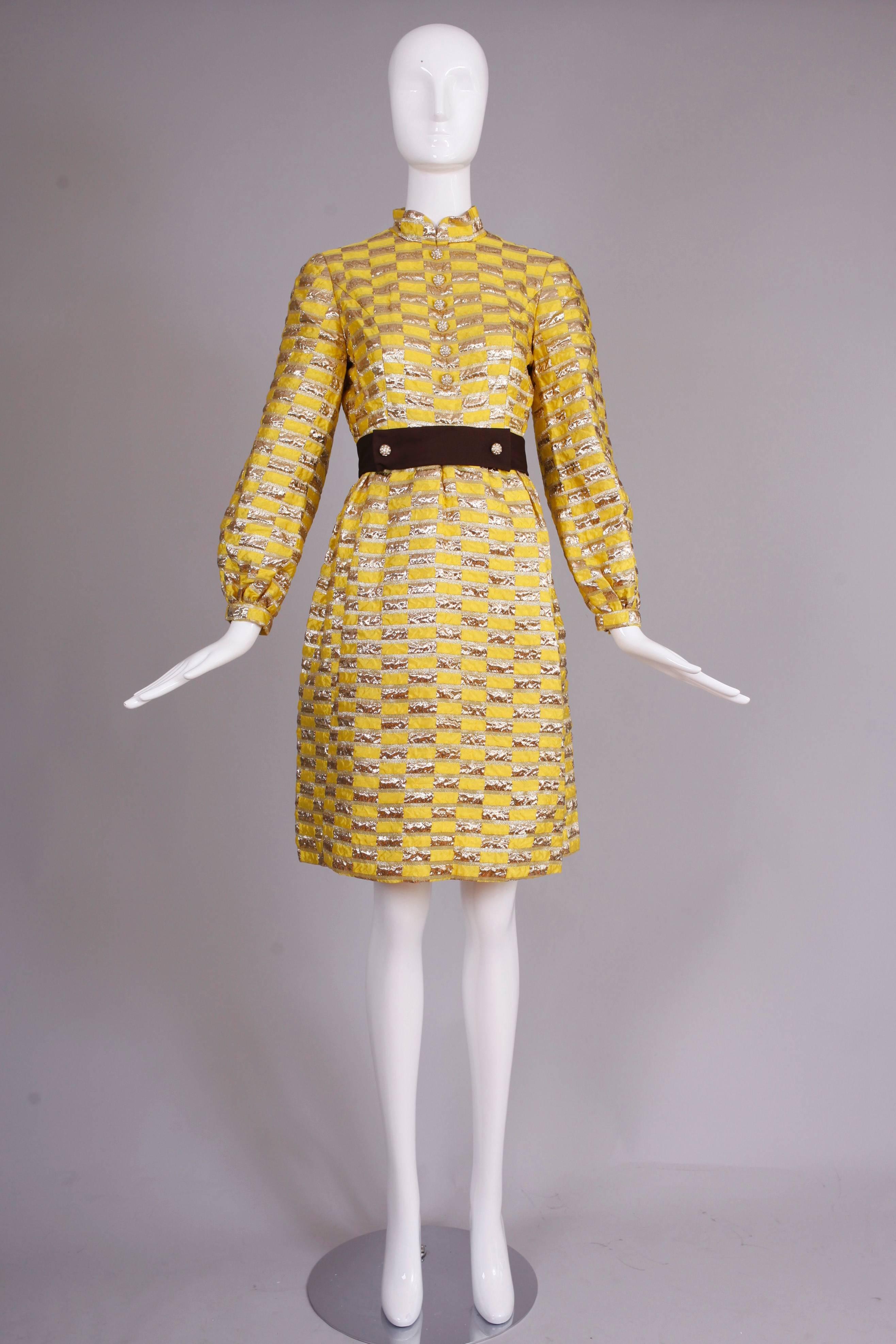 1970's Oscar de la Renta yellow and gold lame cocktail dress with chocolate brown attached belt and decorative half-domed rhinestone buttons. In excellent condition - one button is missing one rhinestone. Size tag 6 please consult