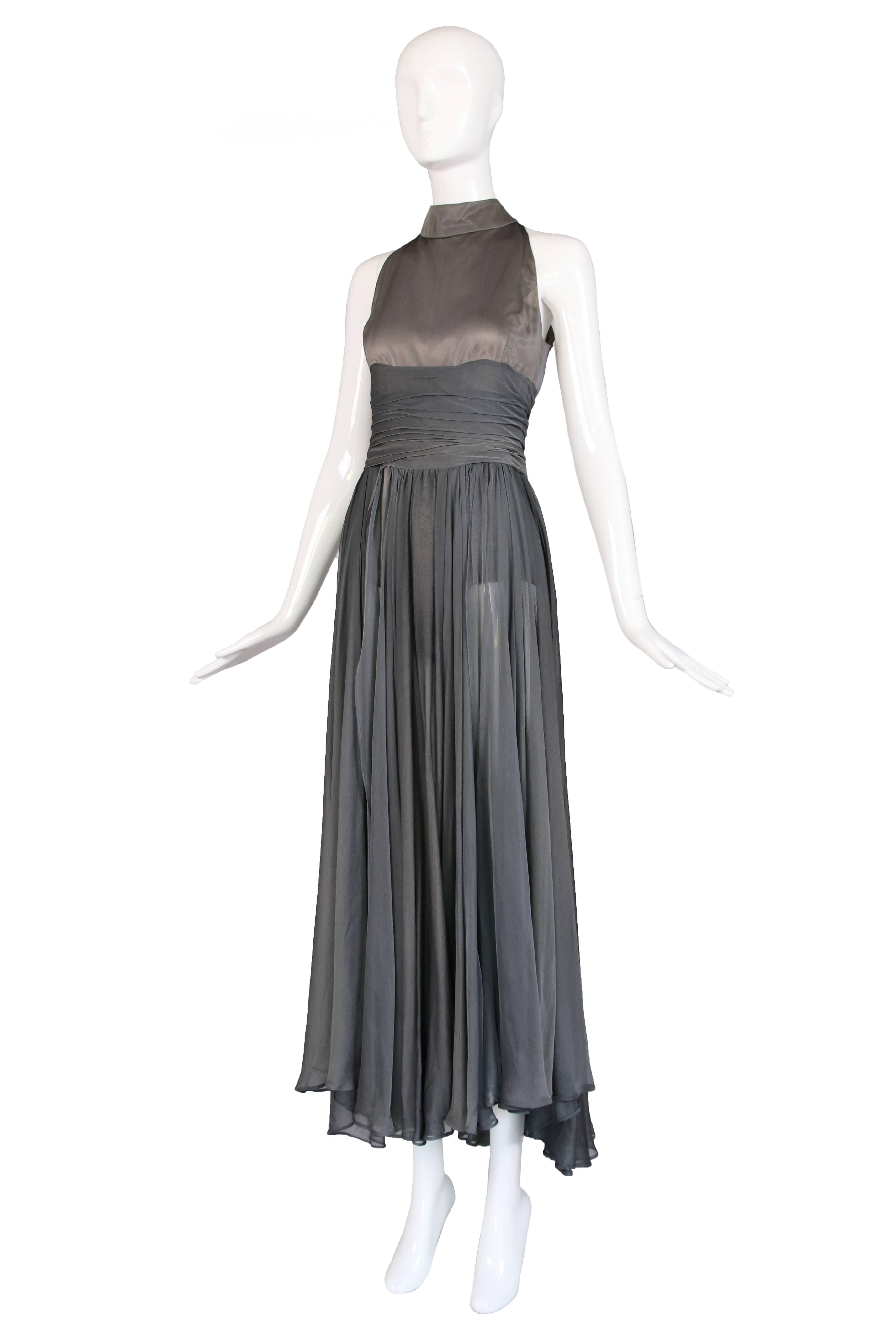 Circa 2003 Chloe by Stella McCartney gray silk chiffon and satin polyester evening gown with open chiffon paneled skirt and visible body suit/hot pants underneath. In very good to excellent condition with two or three light stains in the chiffon