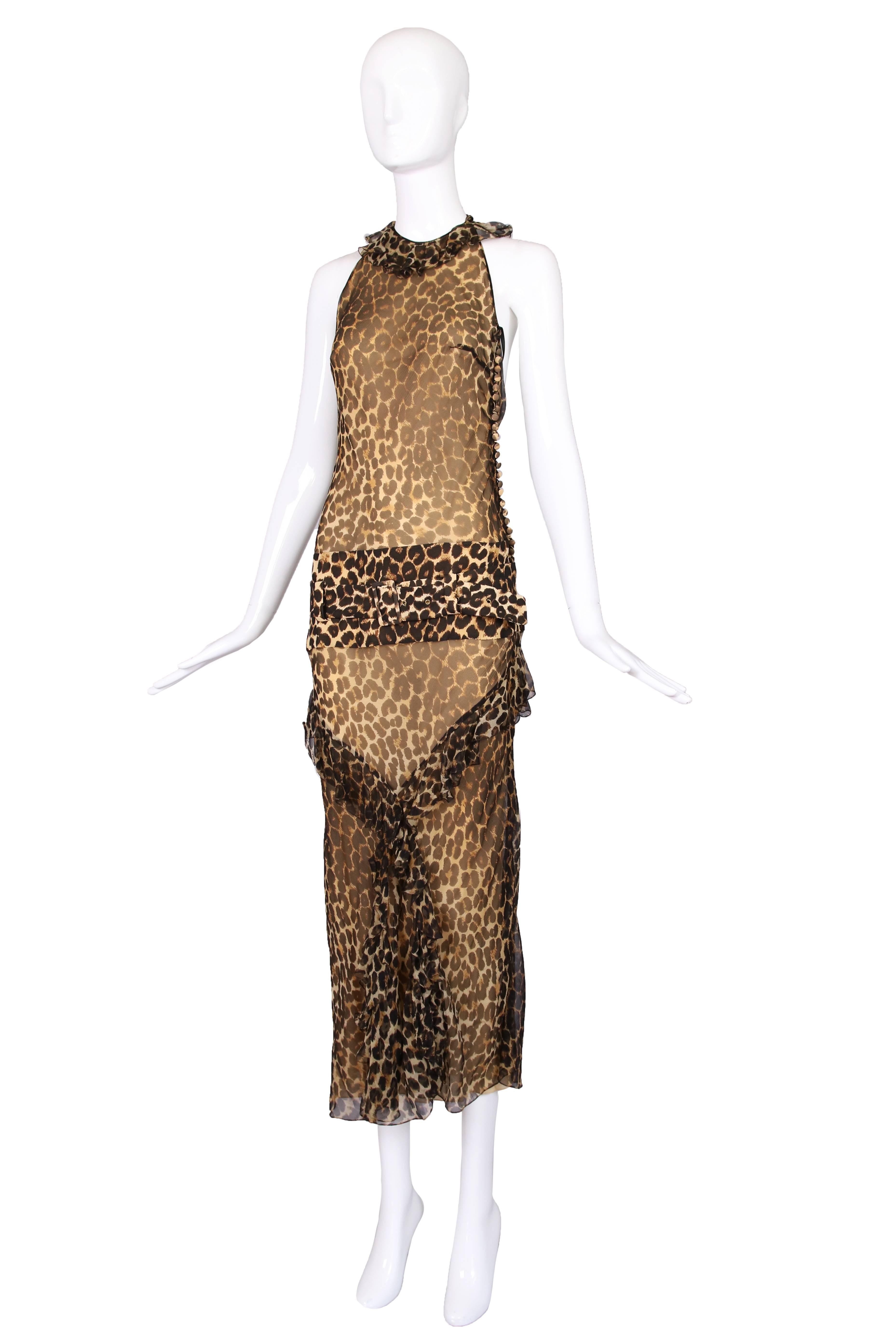 John Galliano leopard print silk chiffon halter gown with ruffle trim, drop waist and belt. In excellent condition. Size S.