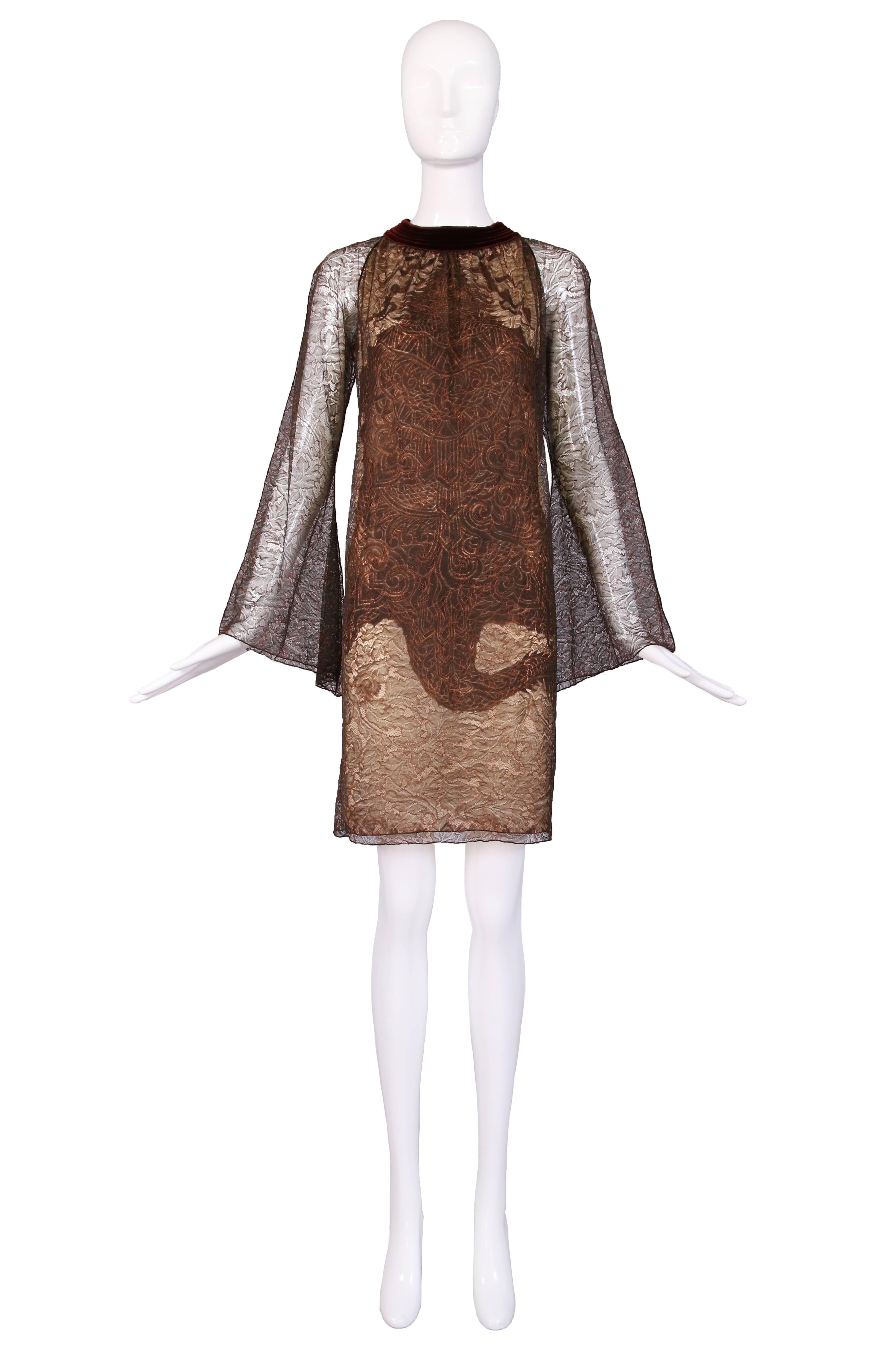 Vintage Jean Paul Gaultier mini dress with a dragon featuring a stretch lace overlay, brown velvet collar and illusion bell sleeves. In excellent condition. US size 6.