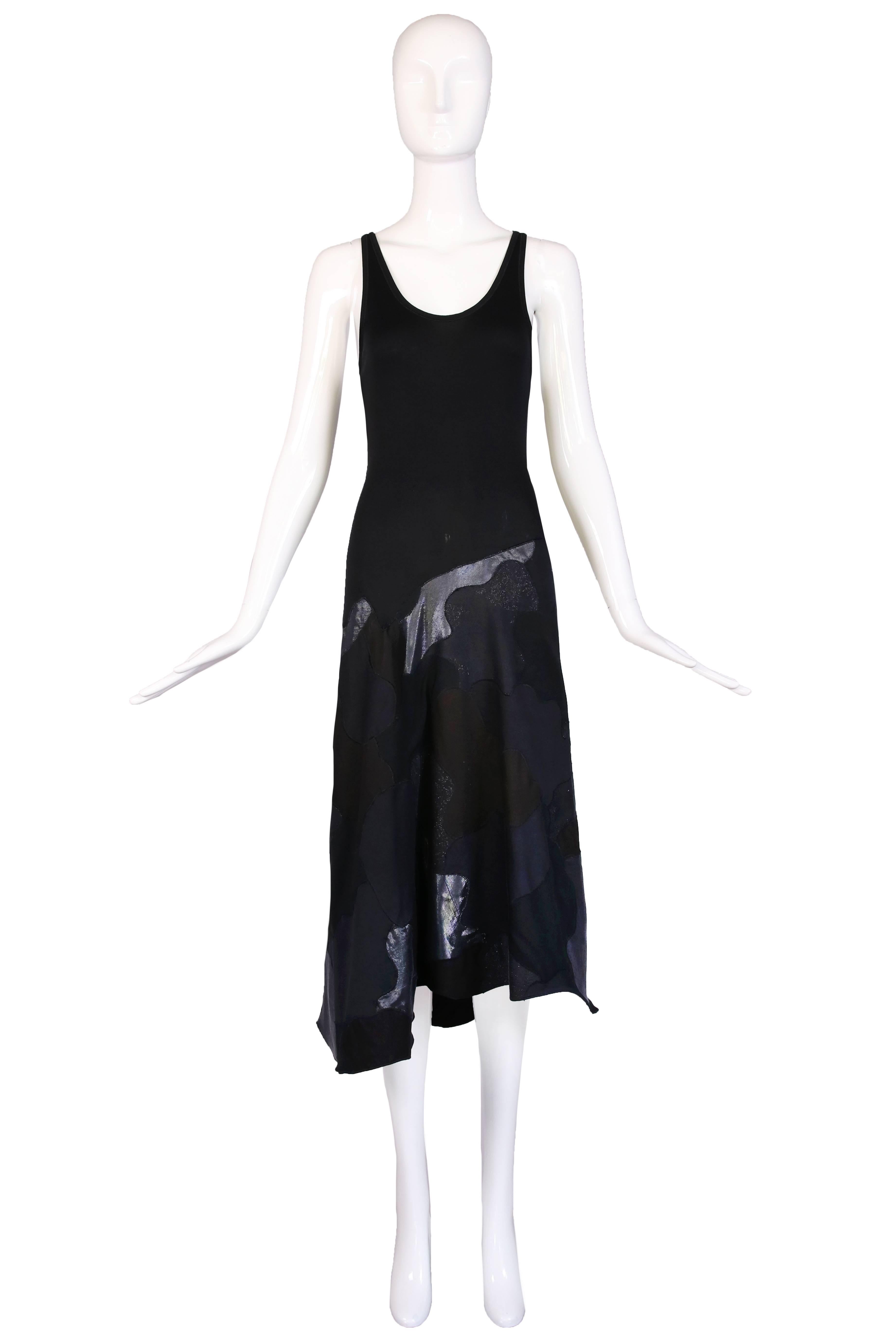 Circa 2003 Alexander McQueen black stretch cotton tank dress with skirt appliquéd in what looks like a cammo print. In excellent condition - missing fabric tag. Size 40.