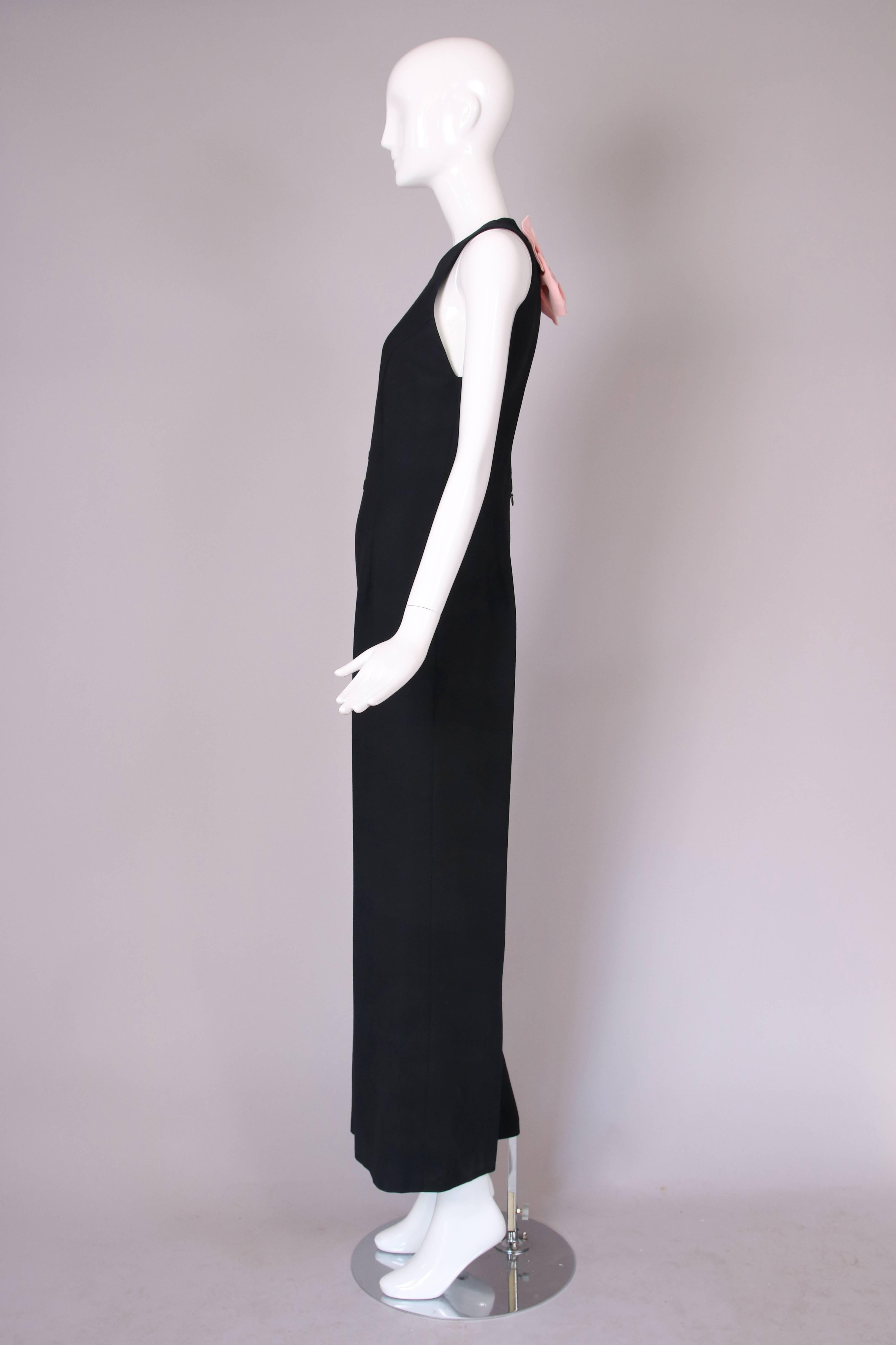 Versace Schwarzer ärmelloser Woll-Overall mit offenem Rücken und Schleifendetail 1