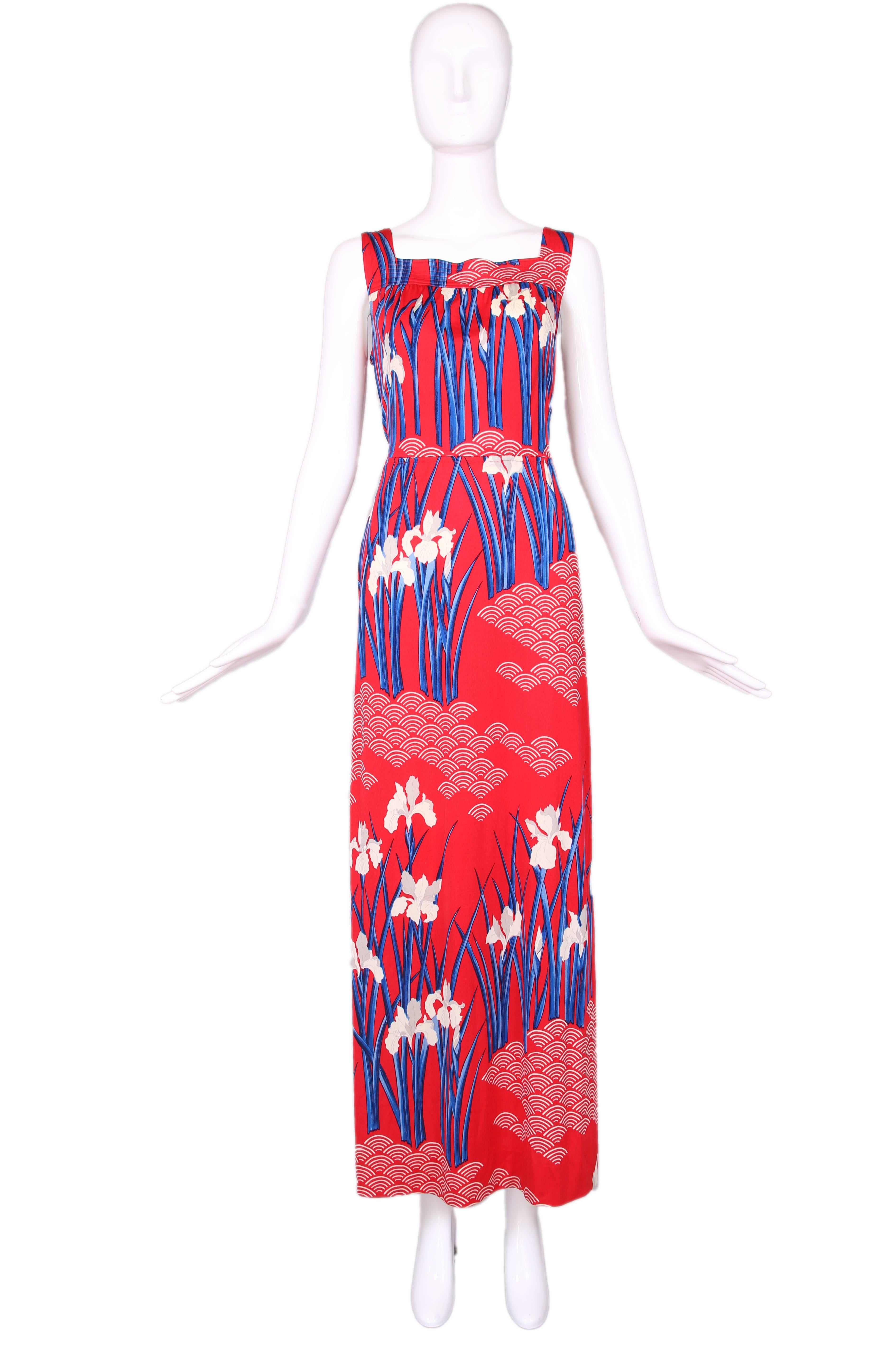 Hanae Mori red, blue, & white floral printed maxi dress. Size 10. In excellent condition, missing original belt.
MEASUREMENTS:
Bust - 36