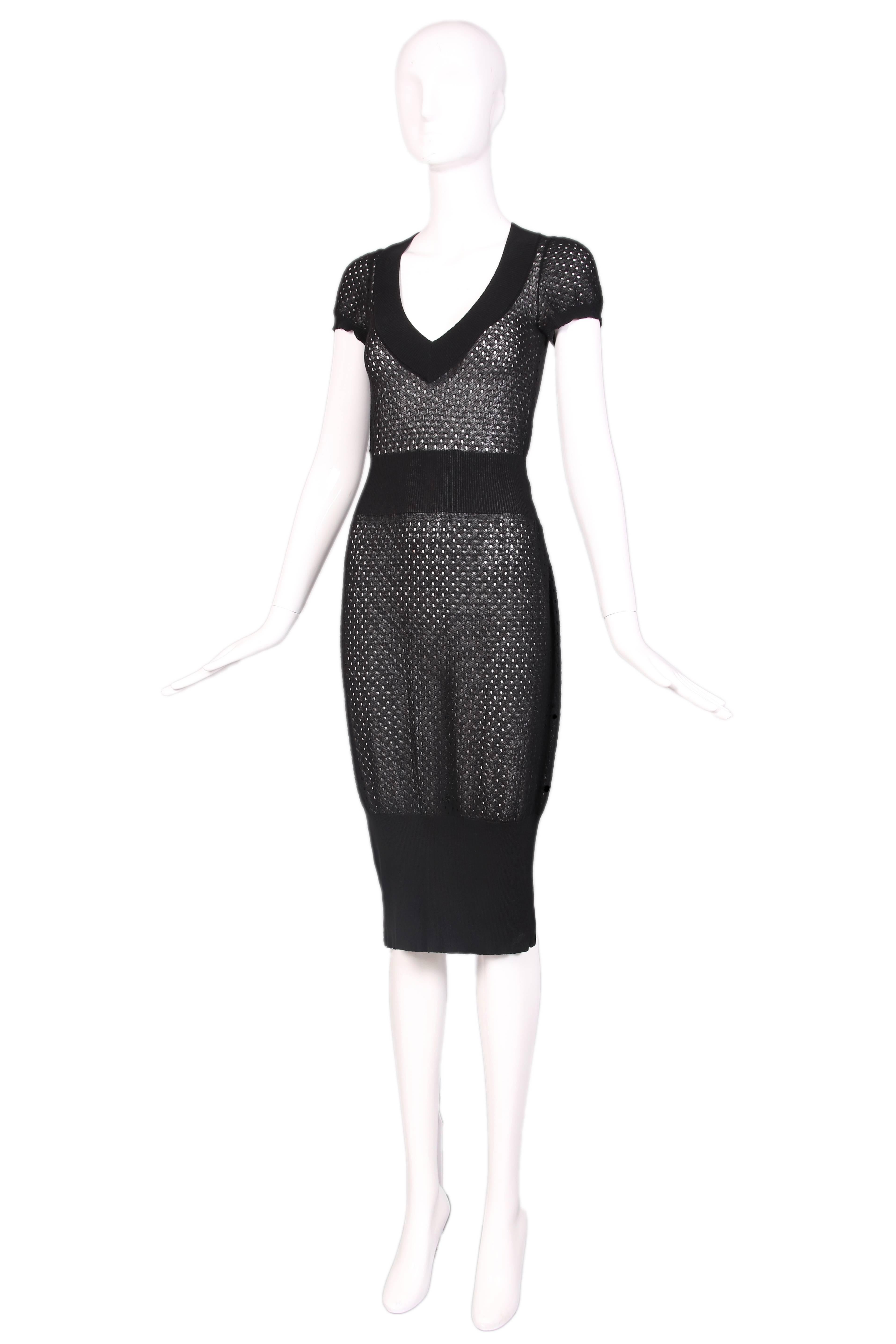 Alaia black stretch open knit net dress with cap sleeves and bubble shape at bottom. In excellent condition. Size US M. 
MEASUREMENTS:
Bust - 32"
Waist - 24-28"
Hip - 42"
Length - 44"
