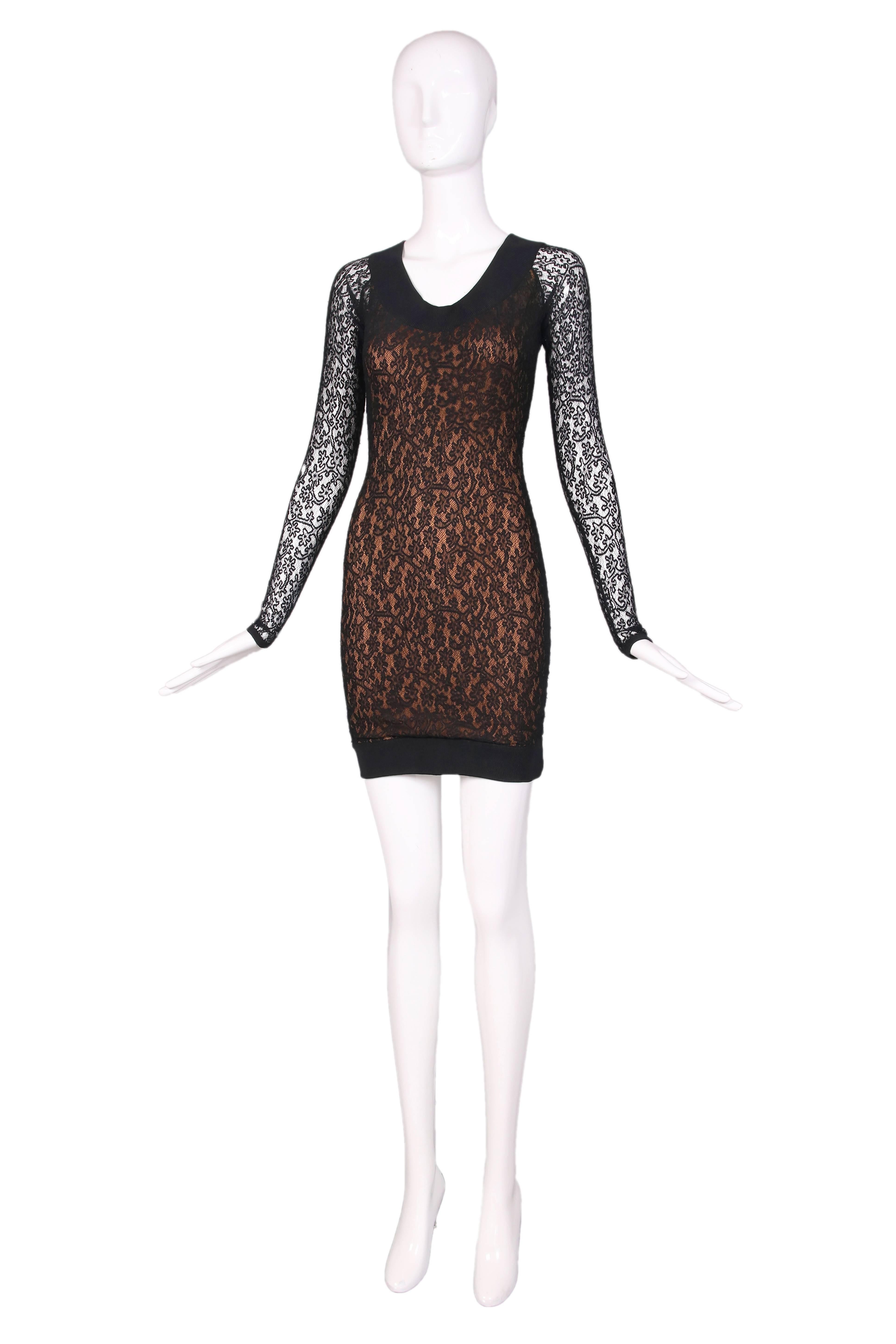 Alaia black lace body hugging mini dress with bronze-colored underlay and sheer lace sleeves. In excellent condition. Size S. 
MEASUREMENTS:
Bust - 30"
Waist - 26"
Hip - 36"
Length - 31"
Shoulder - 14"
Sleeve -