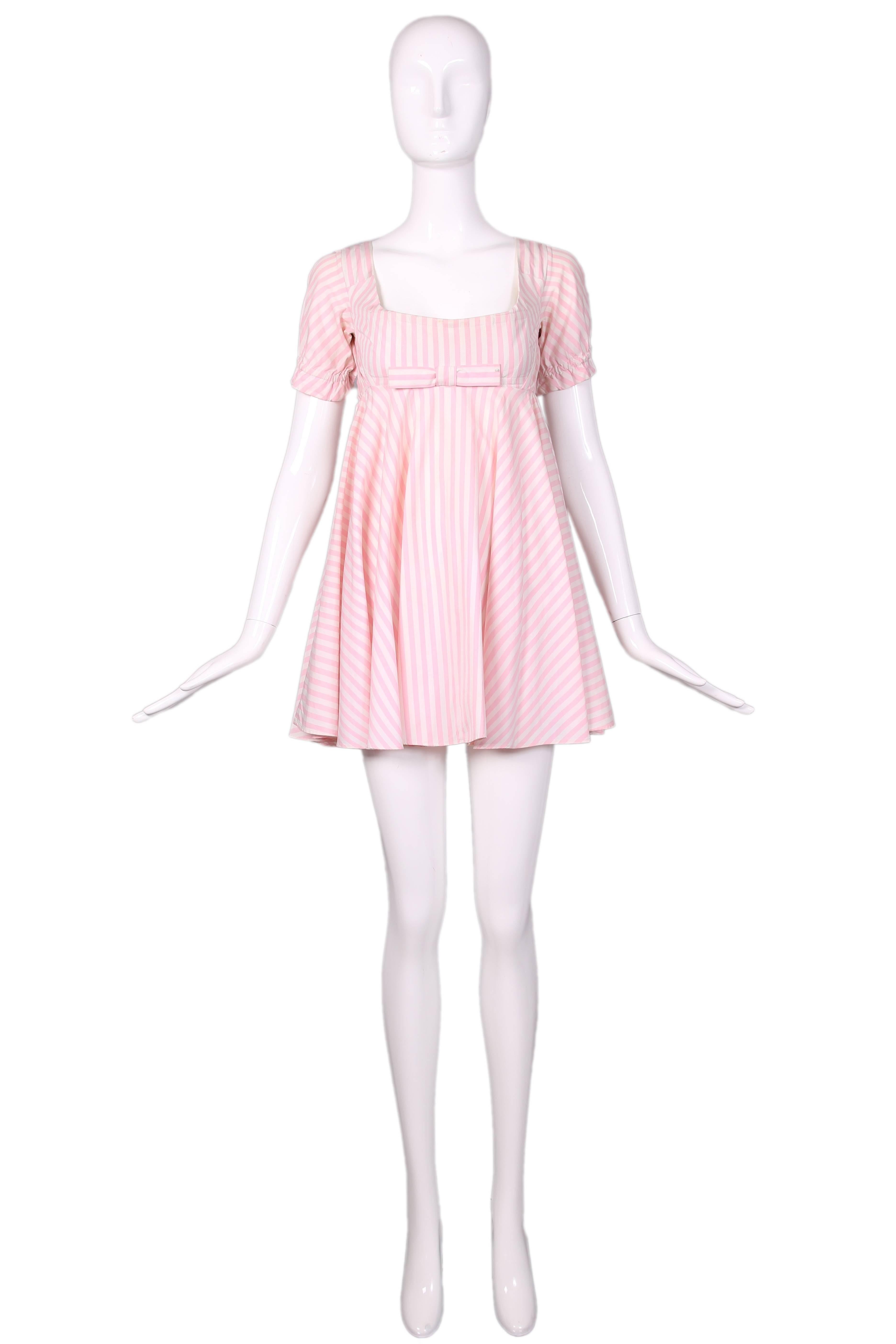 Vintage Vivienne Westwood pink & white striped cotton bustier babydoll dress with bow at bust and cap sleeves. In excellent condition.
MEASUREMENTS:
Bust - 34