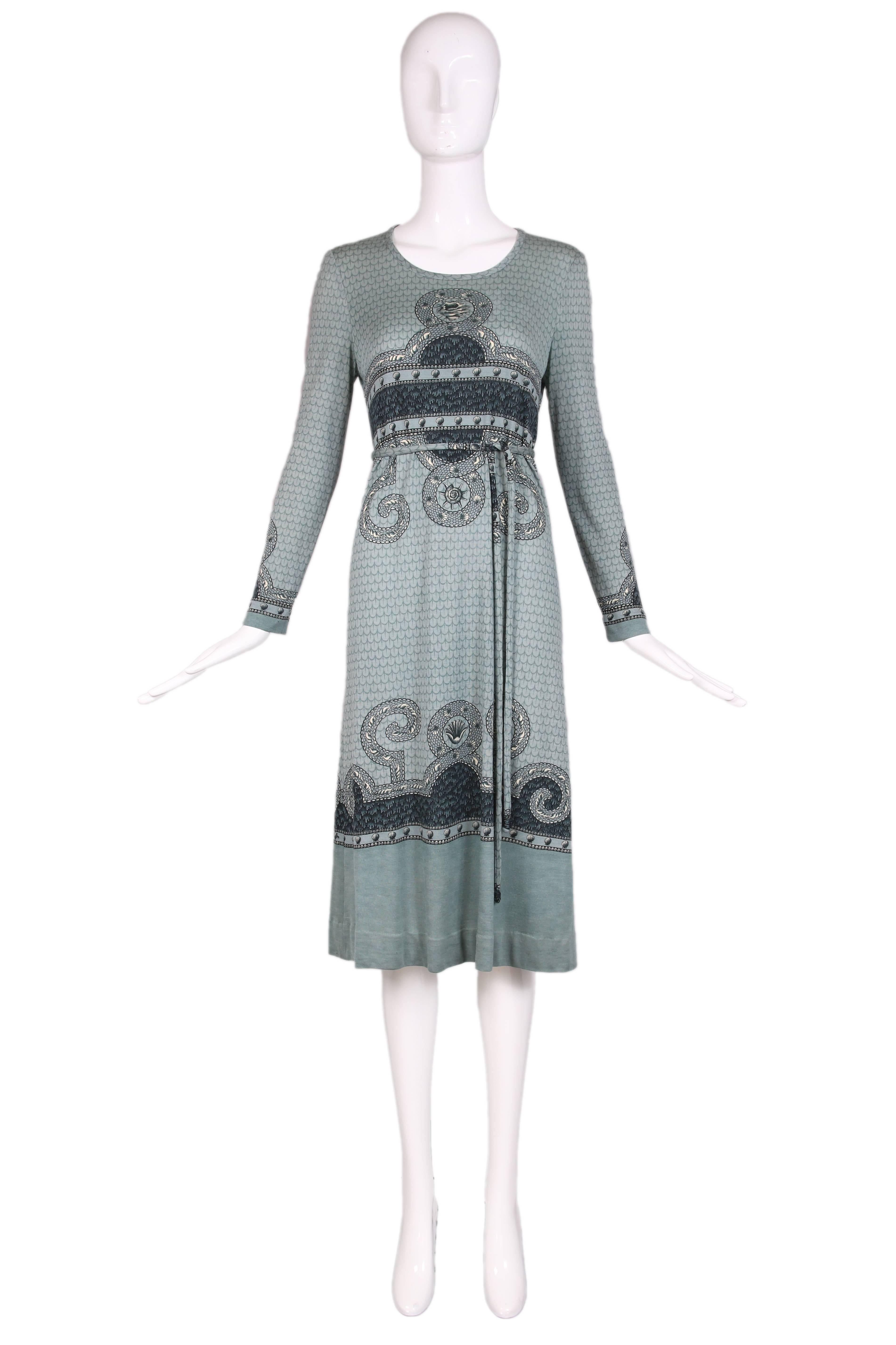 1970's Hermes blue cashmere long sleeved dress with "Rocaille" shell print and matching belt. In excellent condition. No size tag, please consult measurements.
MEASUREMENTS:
Bust - 36"
Waist - 34"
Hip - 40"
Shoulder -