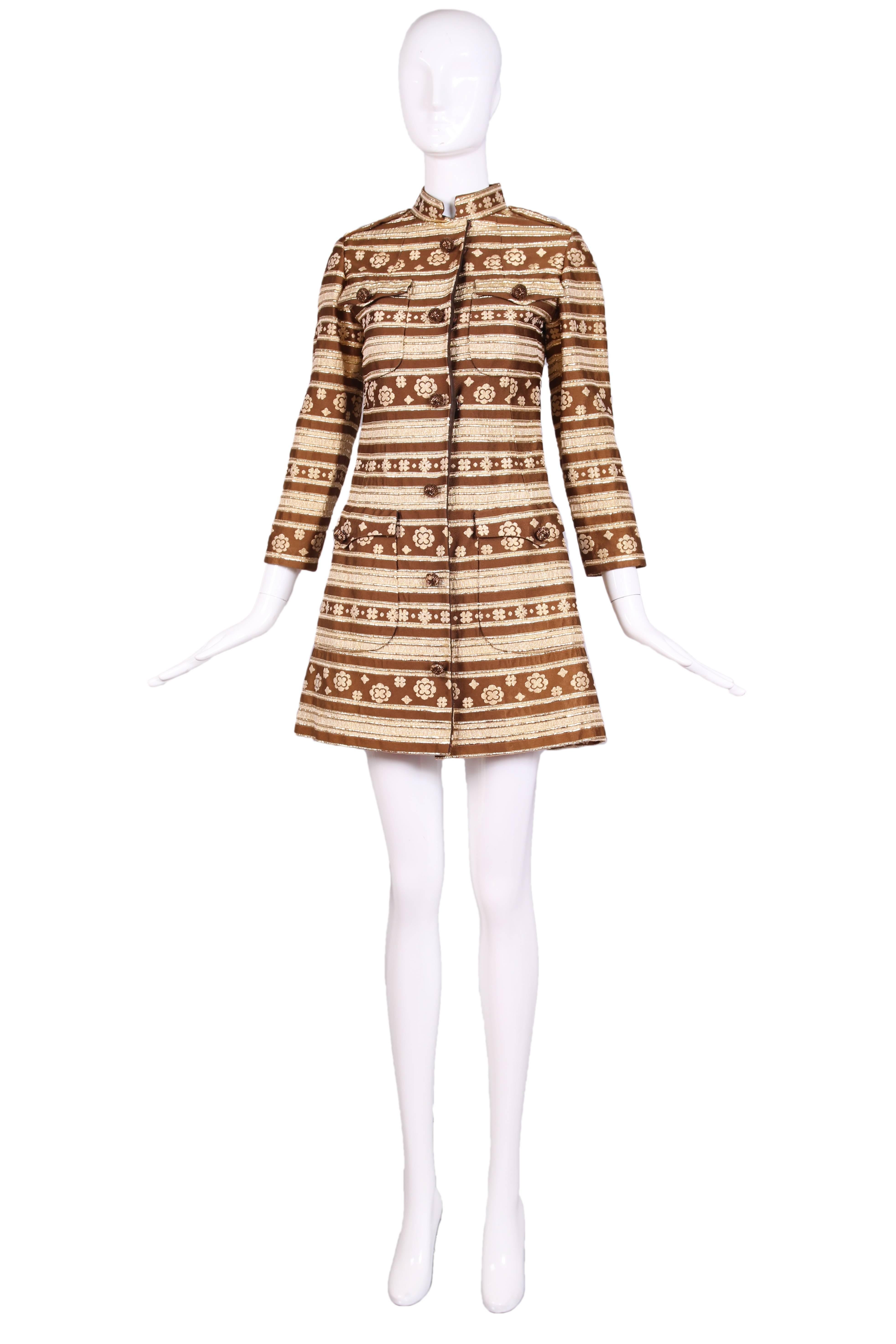 1960's Bill Blass for Maurice Rentner brown and gold lurex stripped coat with bronze beaded decorative buttons.  Snap closure and four front patch pockets. In excellent condition. No size tag, please consult measurements.
MEASUREMENTS:
Bust -