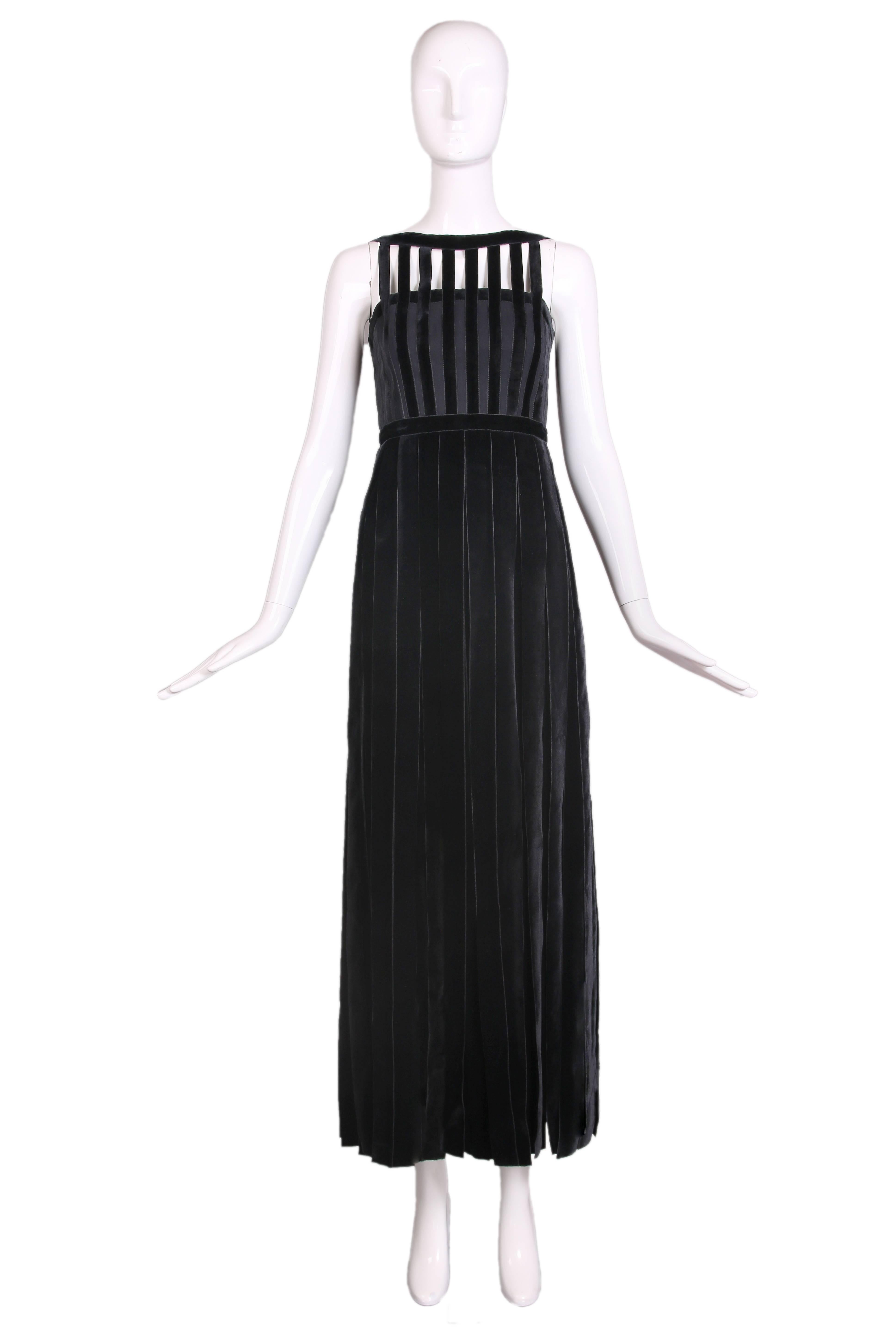 Vintage Chloe black sleeveless gown with a velvet cage top. Dress is a double layer - Beginning at the waist, long velvet ribbons overlay a sheer skirt. The skirt has velvet trim and two additional horizontal velvet stripes. Two fabric-covered