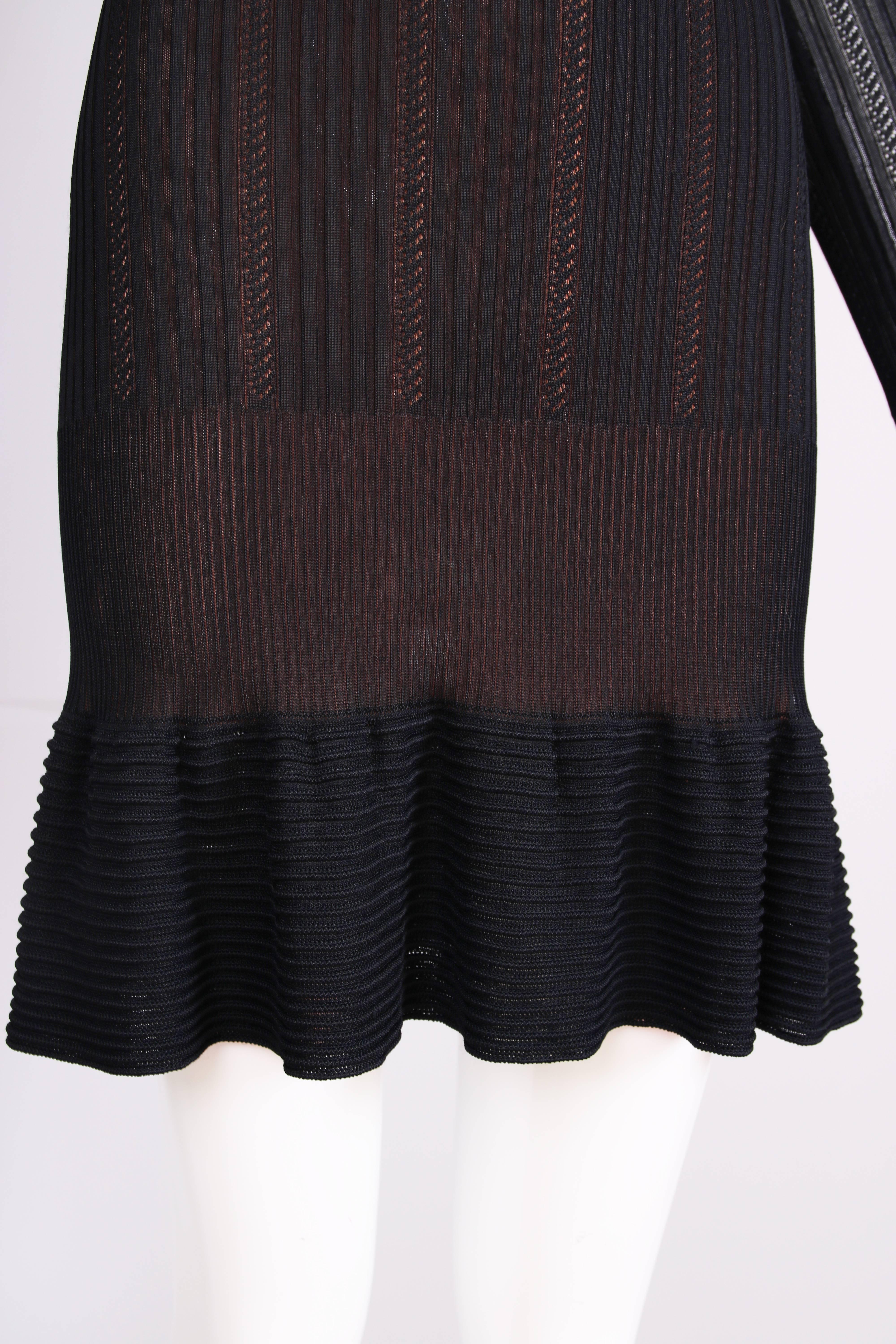 Women's Alaia Black Sheer Stretch Viscose Long Sleeved Mini Dress W/Flounced Hem For Sale