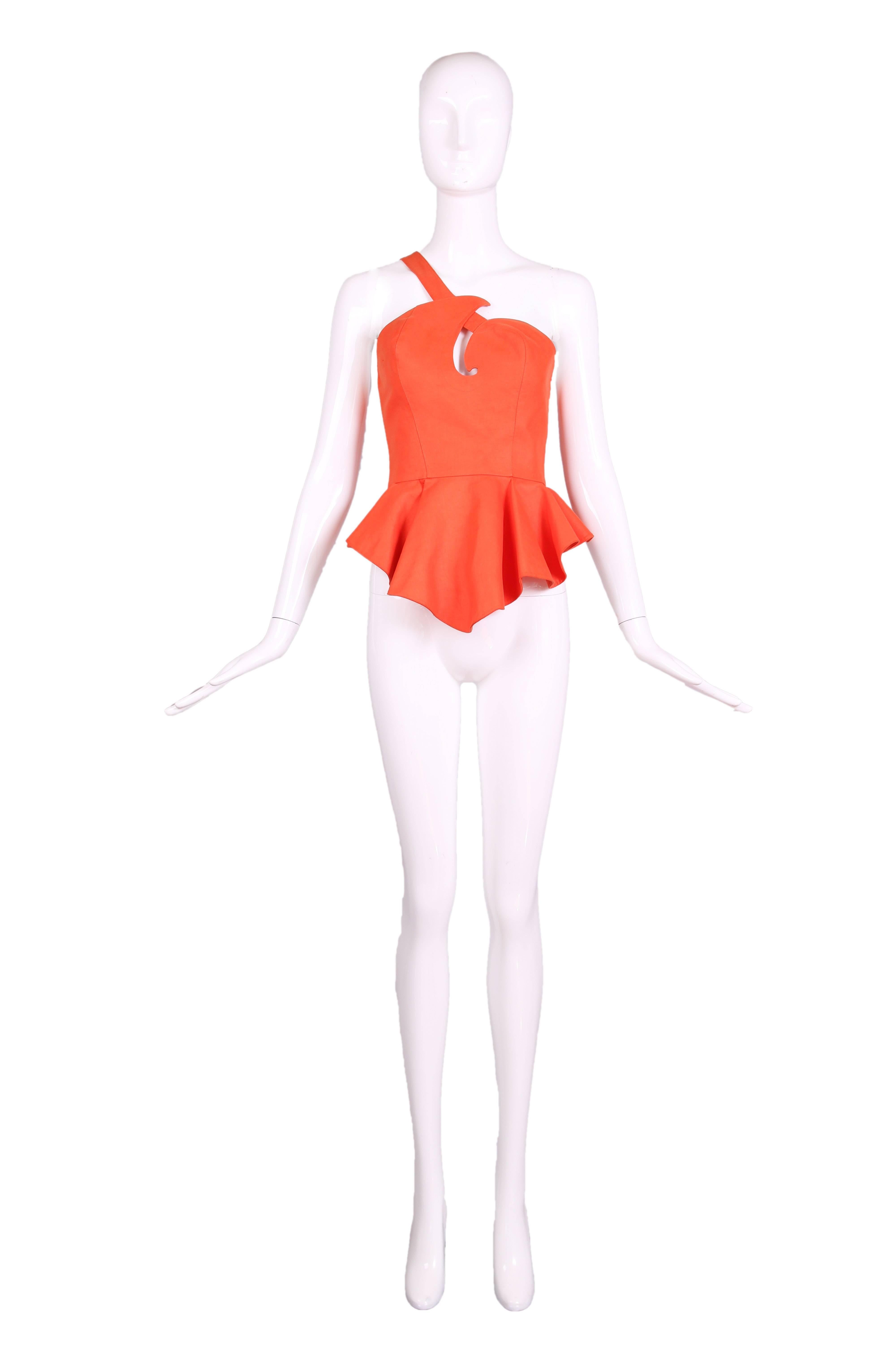 Vintage Thierry Mugler orange single strap, structured sleeveless bustier top with peplum waist and orange snap closures at the back. There is no fabric tag but the fabric feels like a heavy cotton. Size 38 - see measurements. In excellent