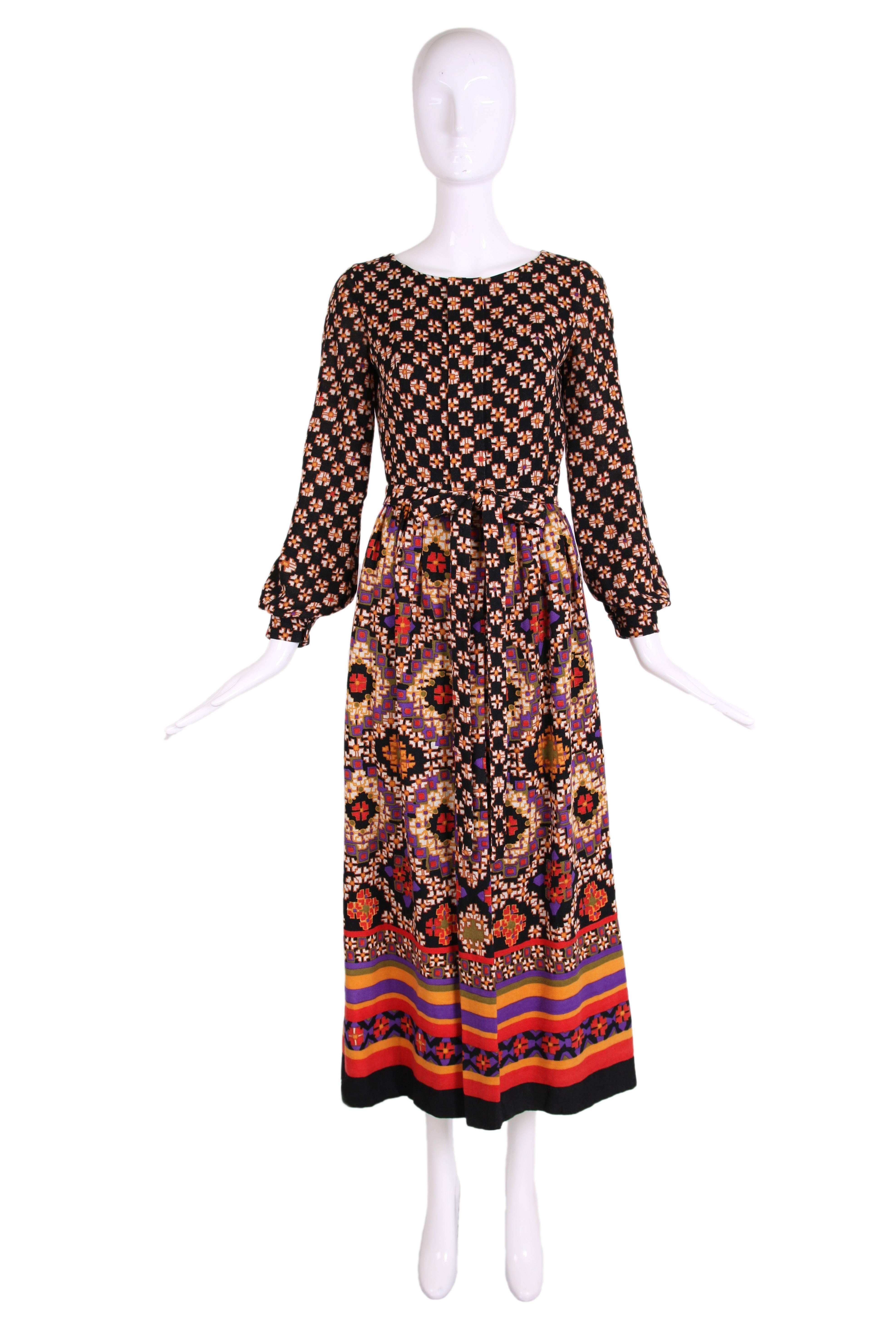 1970's Lanvin maxi dress with a geometric print in a light muslin wool. Hidden zipper closure up front and comes with a self belt. In excellent condition. No size tag, please consult measurements.
MEASUREMENTS:
Shoulders - 14.5