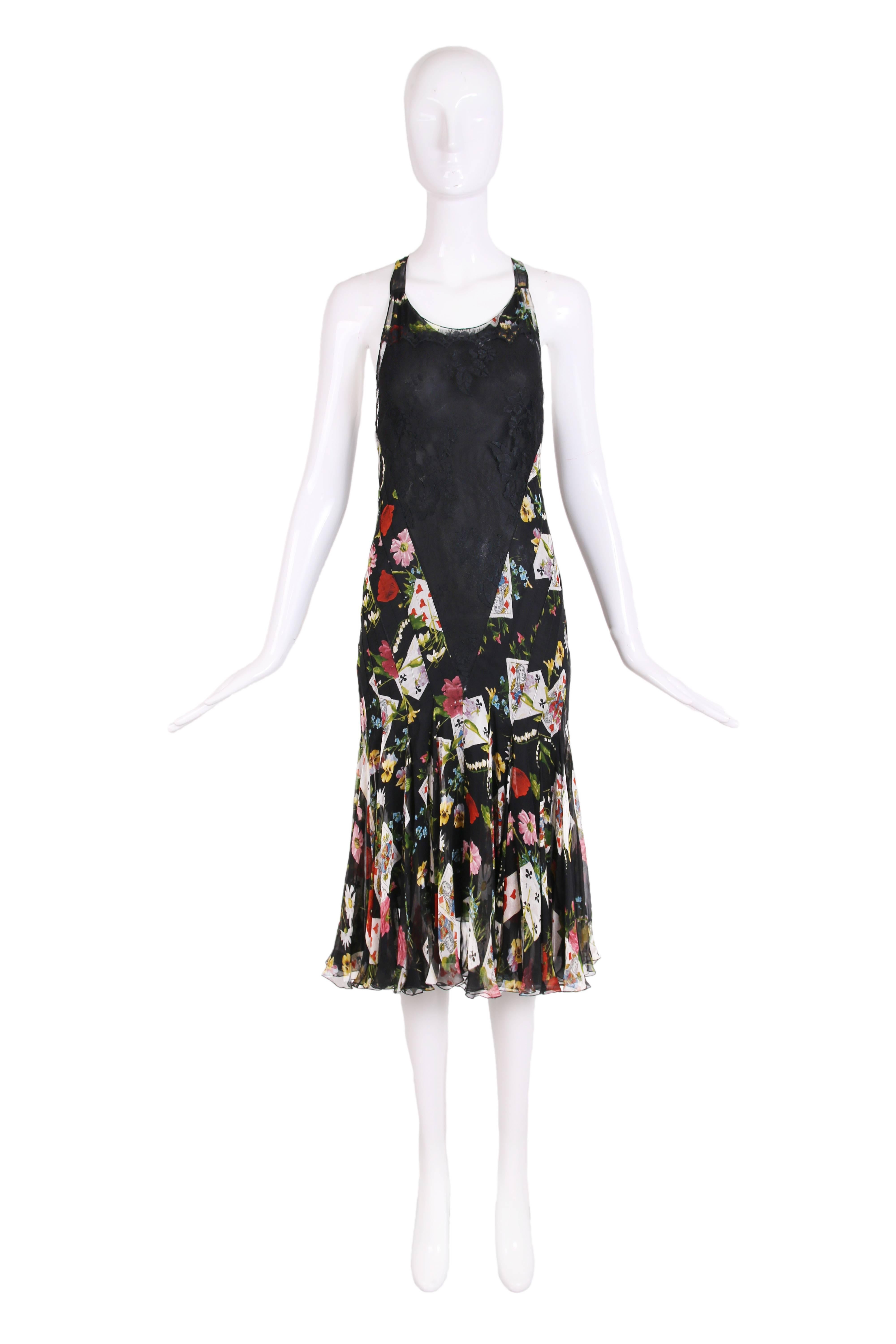 Christian Dior by John Galliano bias-cut chiffon and lace cocktail dress with playing card print. Bodice is made from black lace and skirt made of playing card and floral print flared skirt and 