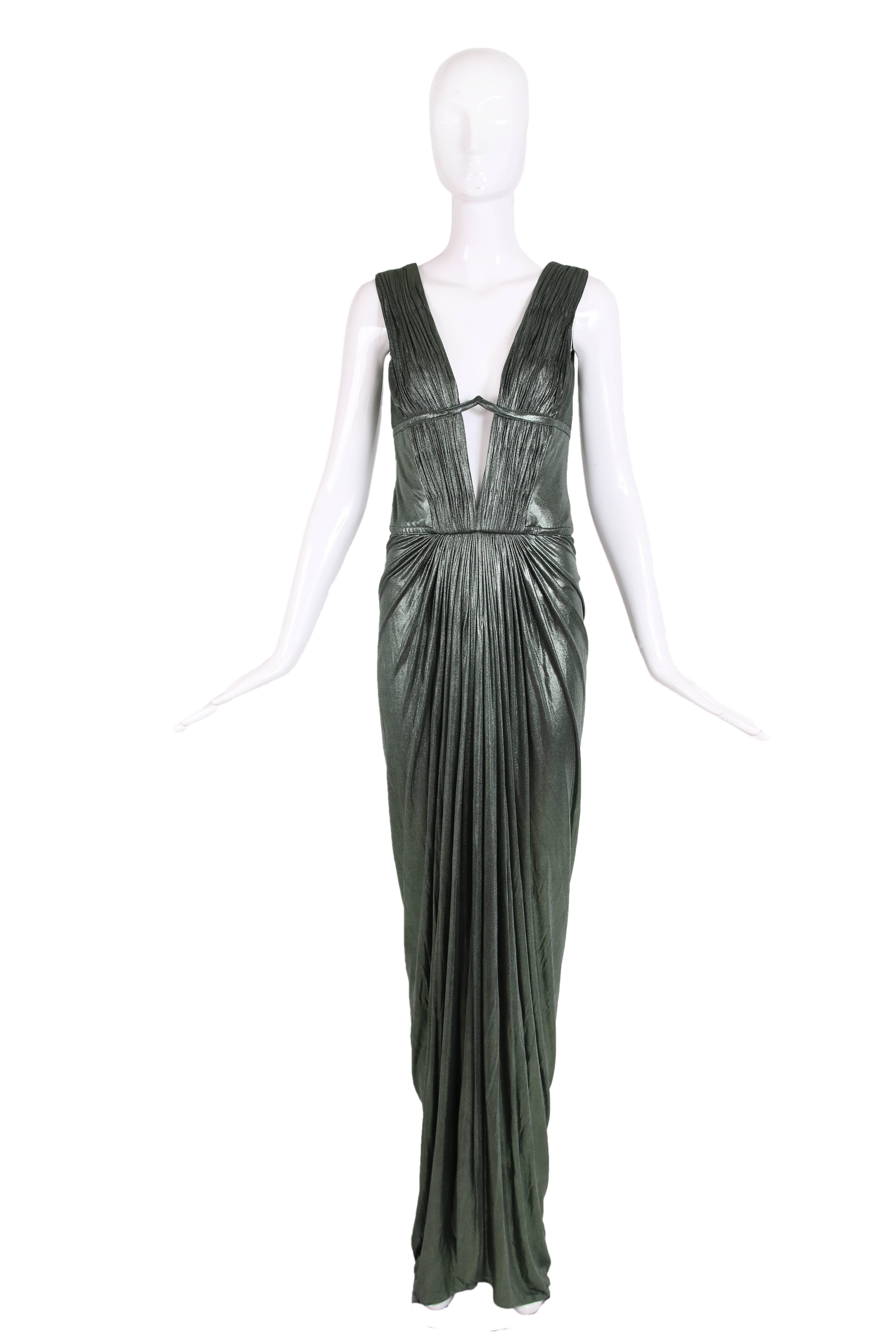 Roberto Cavalli mineral green metallic cupro stretch gown with boned bodice, frontal slit and back pleats held by shaped stiffened band. There is a body suit at the interior. In excellent condition. Size 40 - please consult