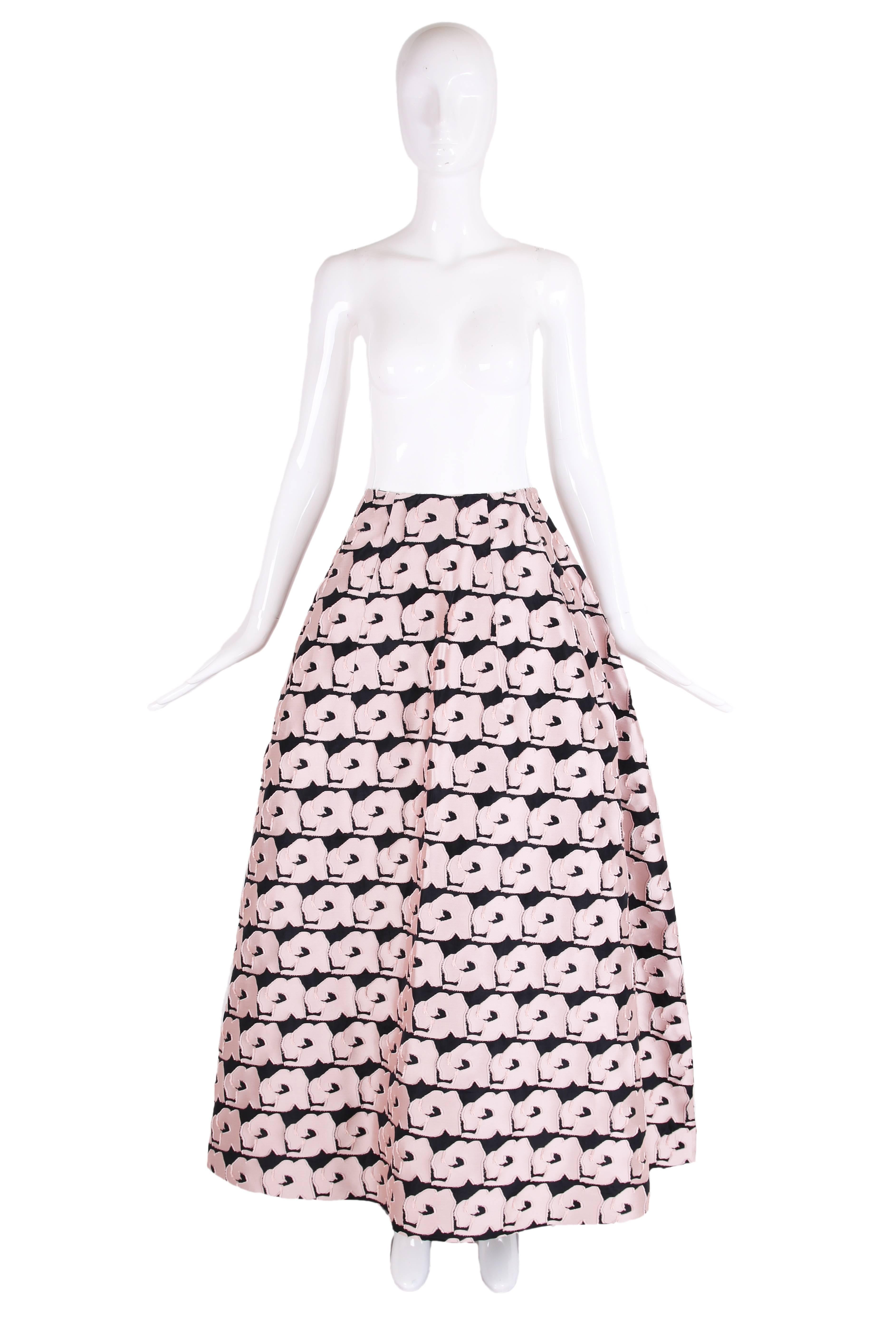 2013 Christian Dior blush pink floral ball skirt set on a black background. It is lined in silk with tulle to give its shape, there is a side zipper closure with hook and eye. Size tag 8. In excellent condition - only worn once by original owner for
