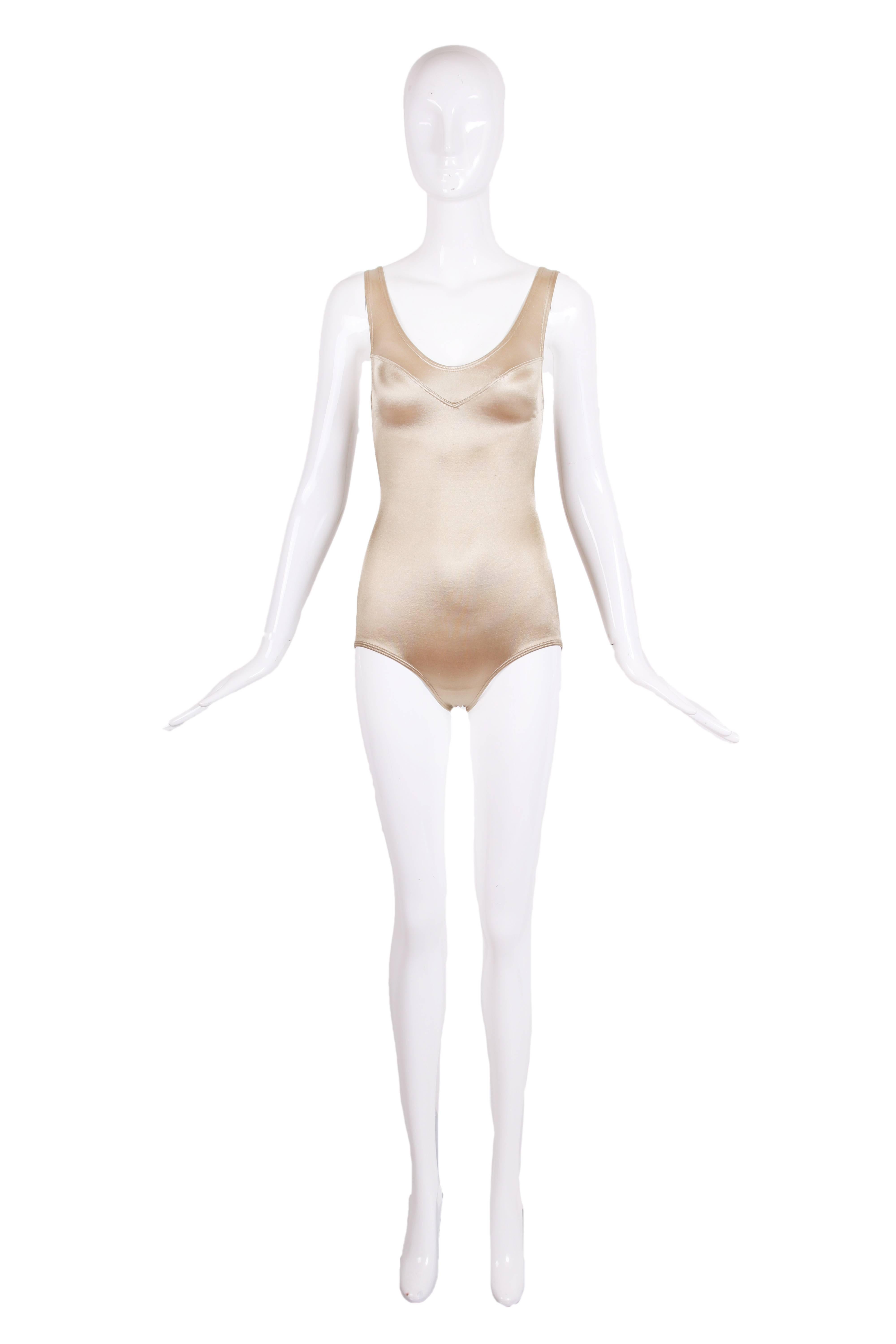 Vintage Azzedine Alaia champagne colored satin stretch one-piece bathing suit. In excellent condition - appears to have never been worn. Very small - most likely will fit a size 2.