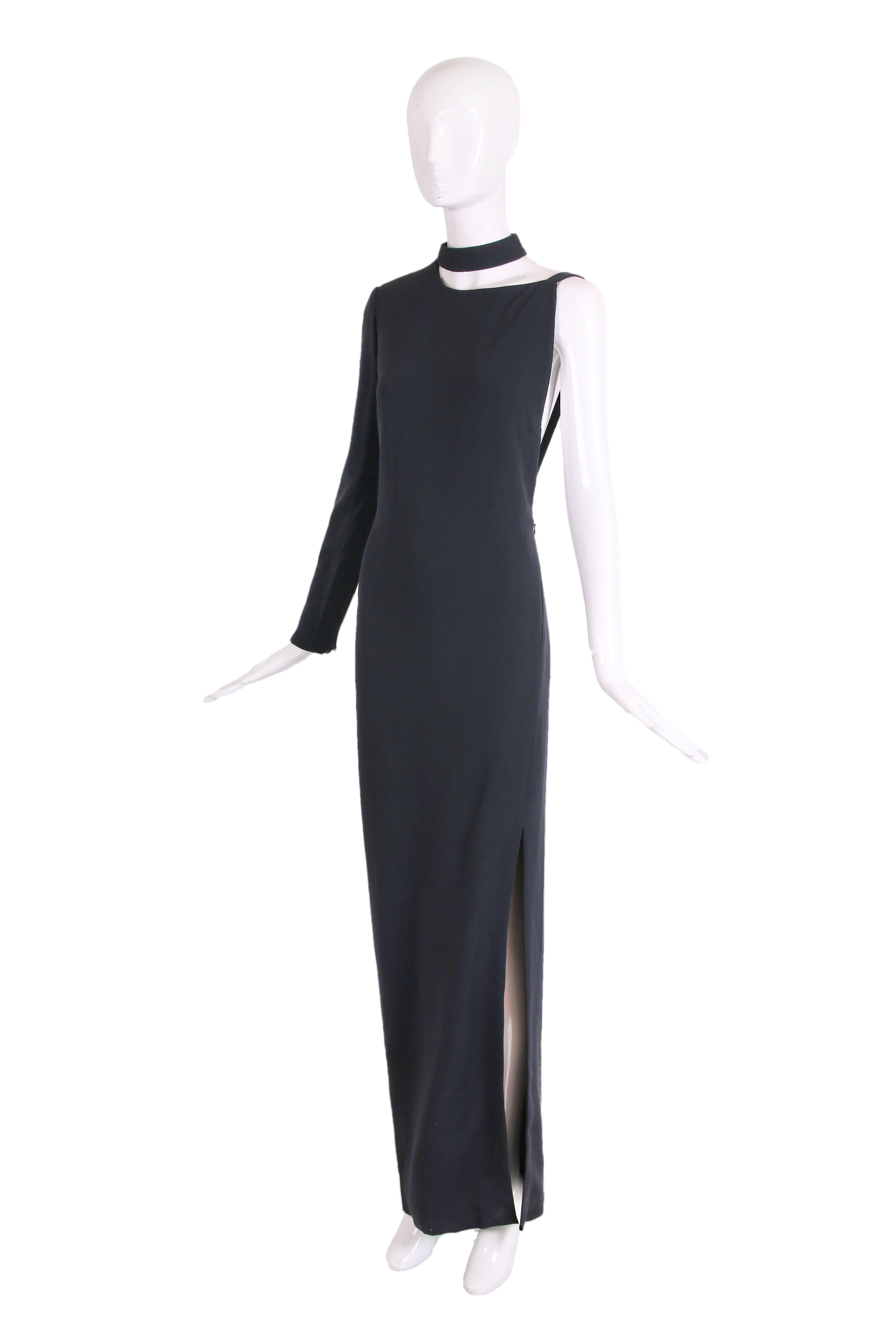 Tom Ford black rayon blend single sleeve evening gown with neck ring, thigh-high slit and partial open back. See third photo of Karlie Kloss in exact same dress. In excellent condition - size tag 40.