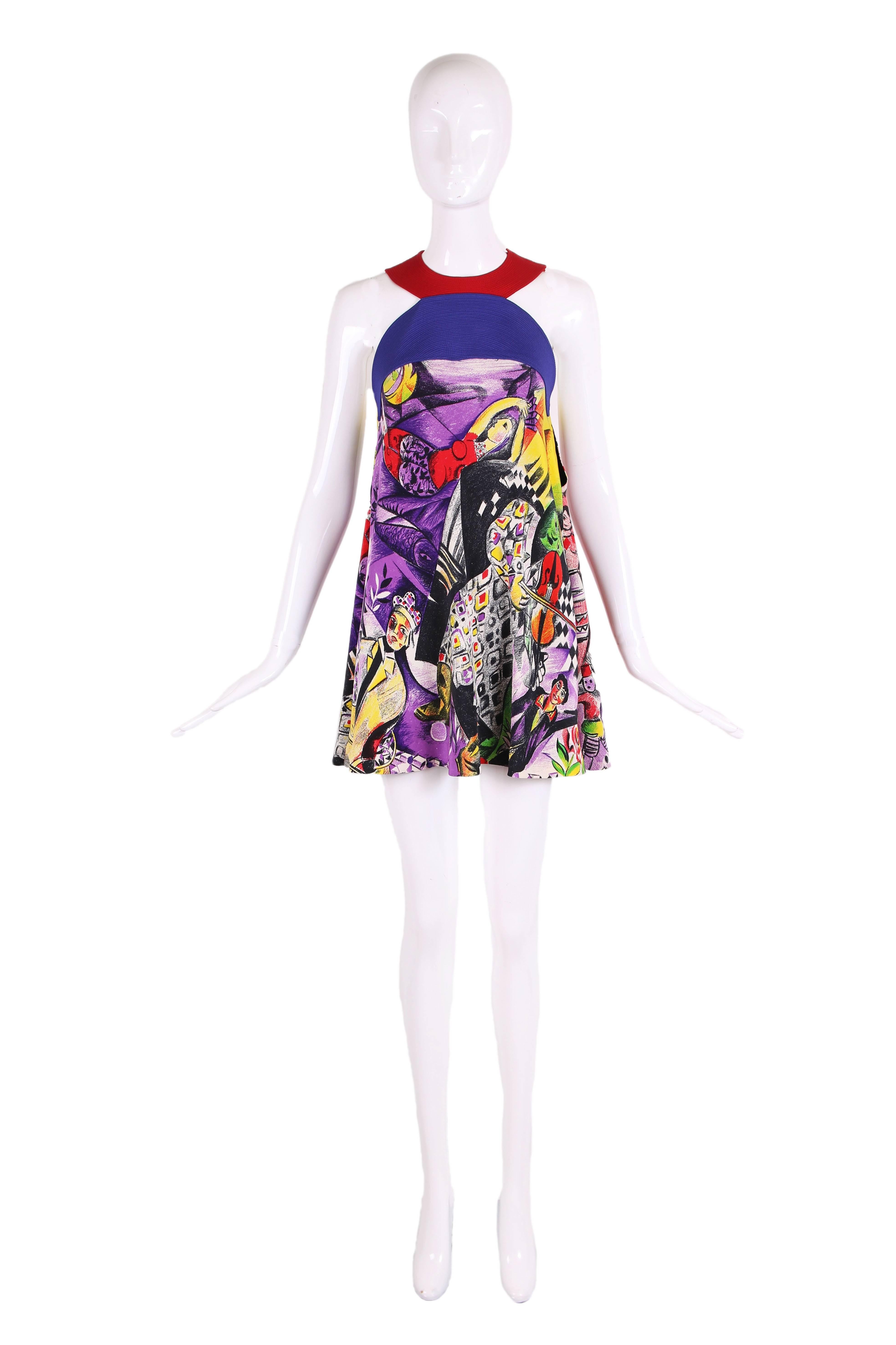 1992 Versace couture multi-colored silk mini dress featuring a print based on the works of Marc Chagall. Hidden snap closures at neck yoke and one hook and eye at the left side seam. In excellent condition.
MEASUREMENTS:
Bust - 34"
Length -