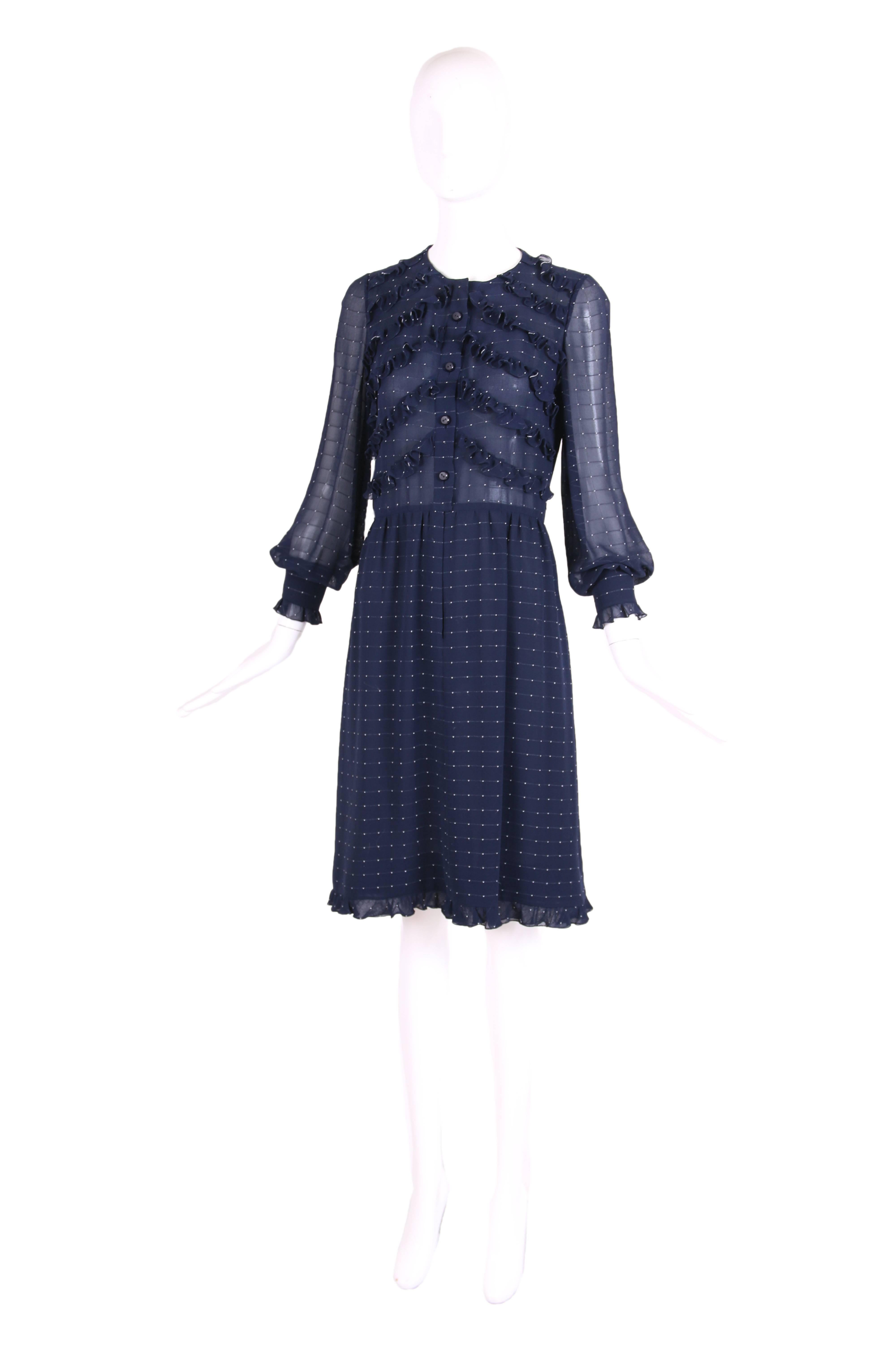 1970's Valentino Haute Couture navy blue silk ruffle trim day dress with white polka dots and long sleeves. Lined inside bottom half of dress. In excellent condition. Snaps at the interior collar indicate there may once have been a detachable collar