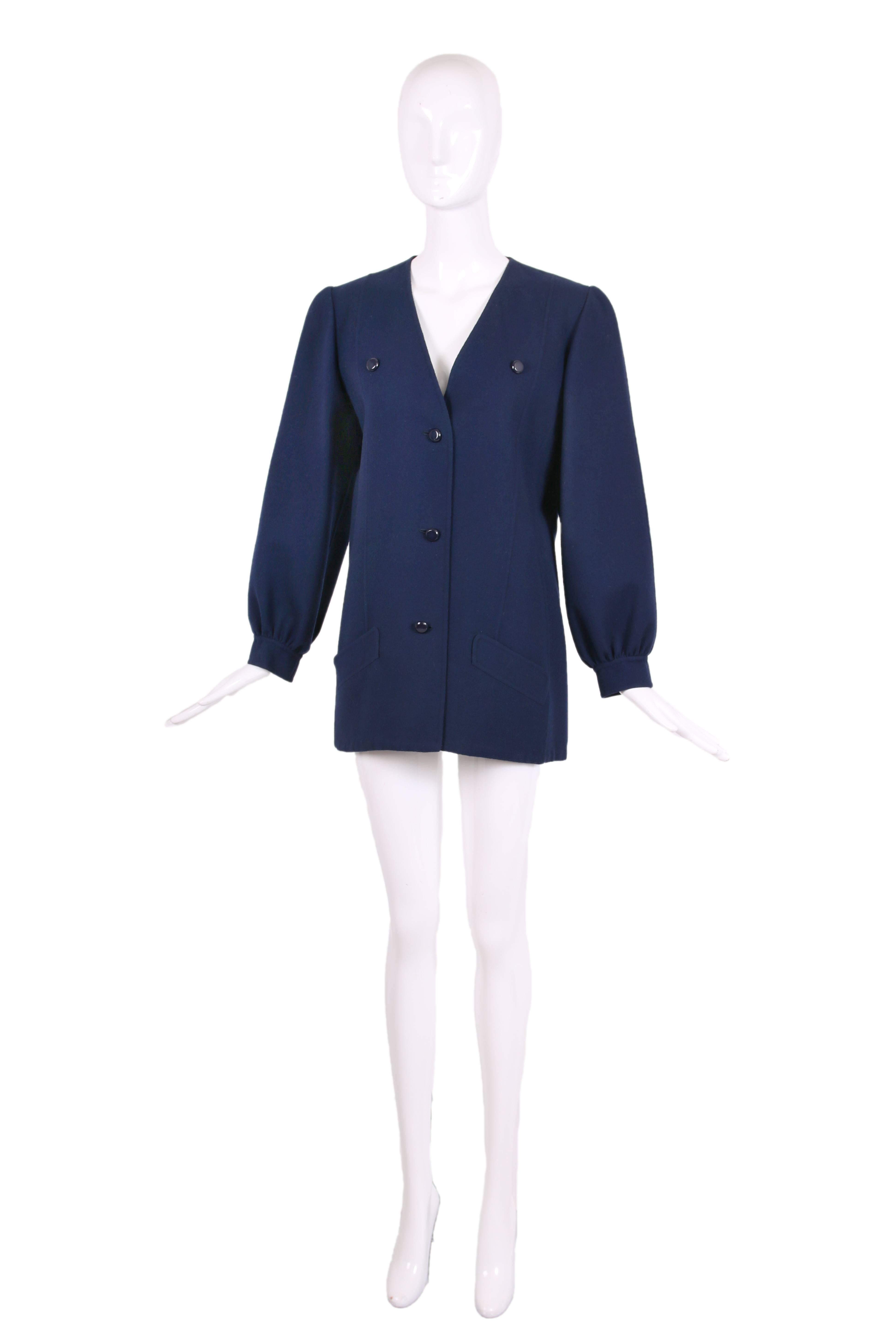 1970's Andre Laug navy melton wool v-neck jacket with shiny buttons down center front and two pockets the bottom. In excellent condition. No size tag - please consult measurements.