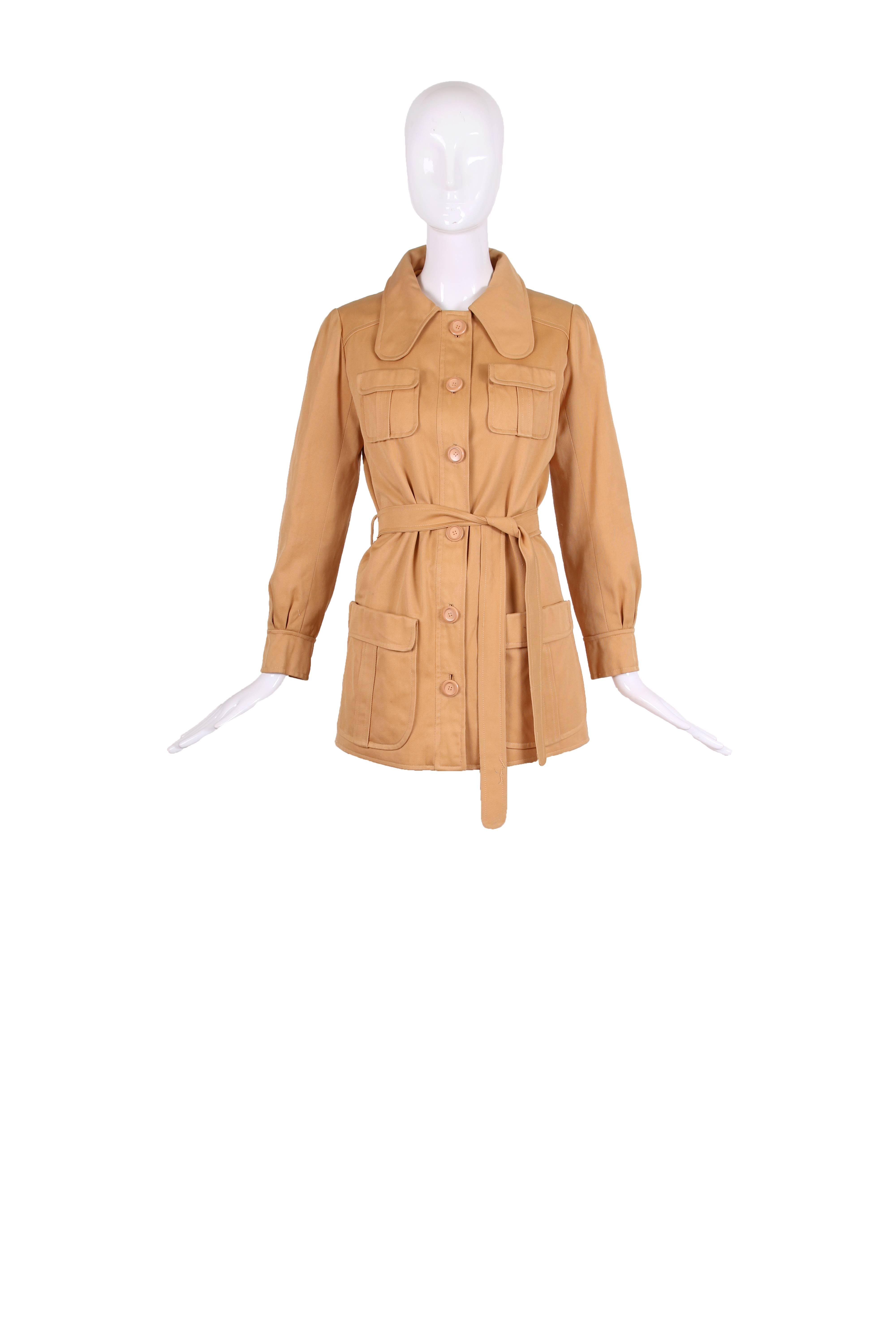 Unlabeled 1970's Ungaro belted caramel-colored jacket with rounded lapels, frontal pockets and matching buttons down center front and at sleeve cuffs. Though the jacket is not labeled, it is attributed to Ungaro.
MEASUREMENTS:
Shoulders -