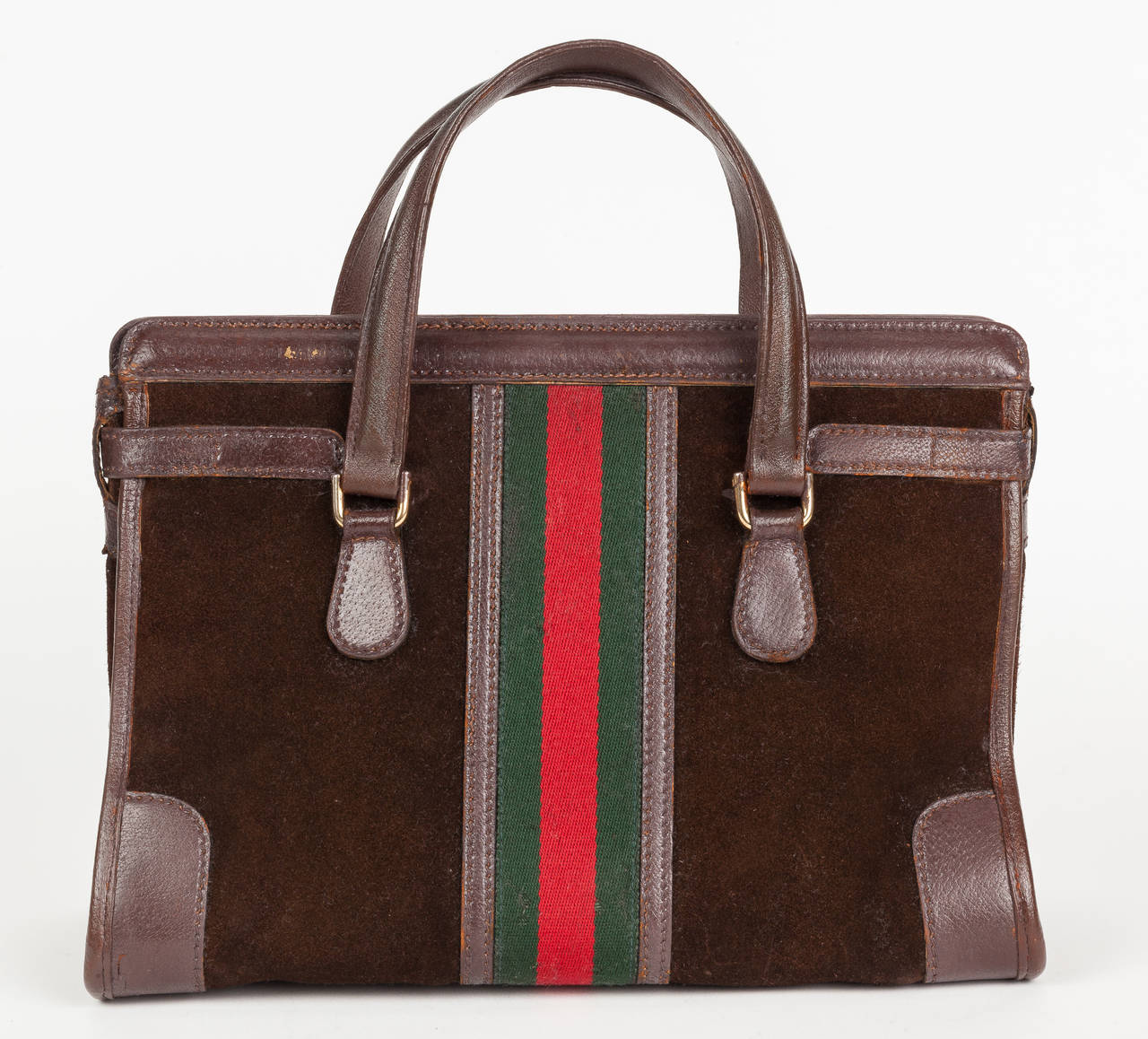 A rare 1970s Gucci brown suede open-top doctor's bag or tote with brown leather trim, gold hardware and the iconic Gucci green and red canvas racer stripe detail at center back and front. Features a wraparound brown leather strap, brass turnlock