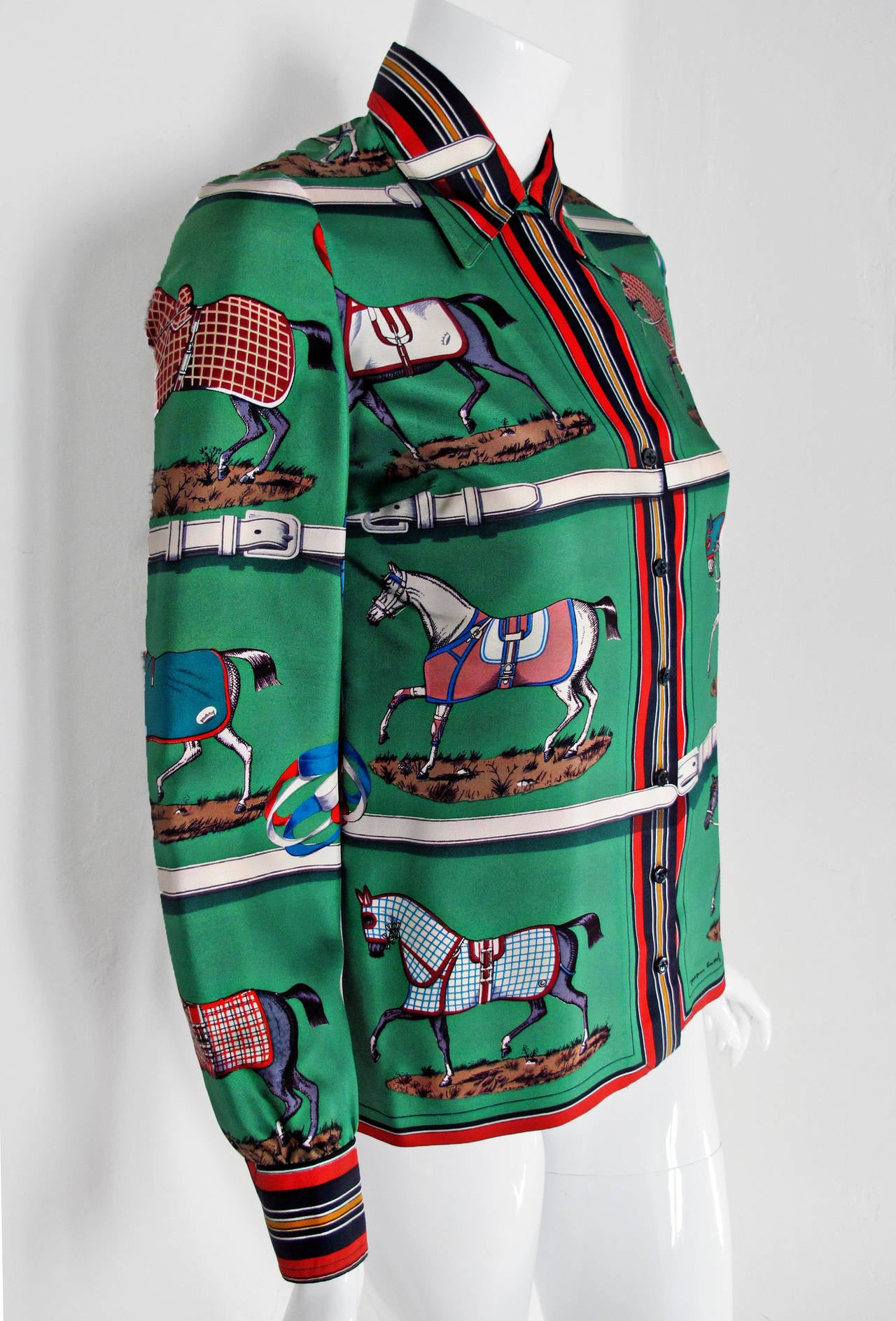 This deep green silk blouse is an Hermes classic - made from the iconic pattern called 