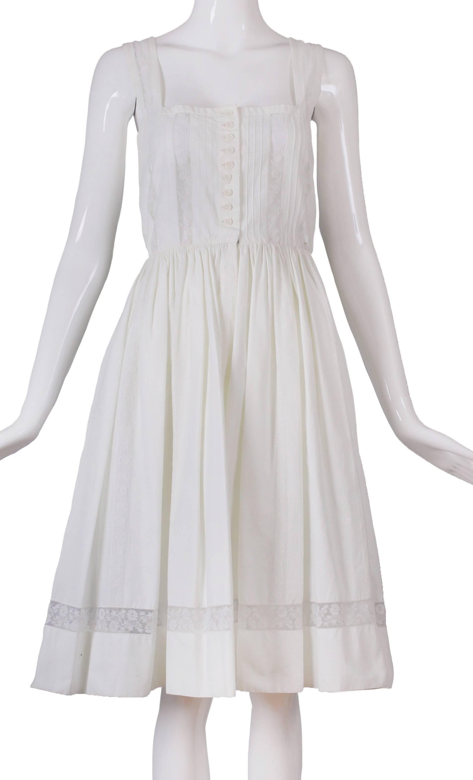 Lanvin haute couture sundress made of cotton and lace circa 1965-1970. Dress features lace straps, a square neckline and ample skirt. On the underside of the Lanvin label are the couture numbers. Please consult measurements as there is no label - my