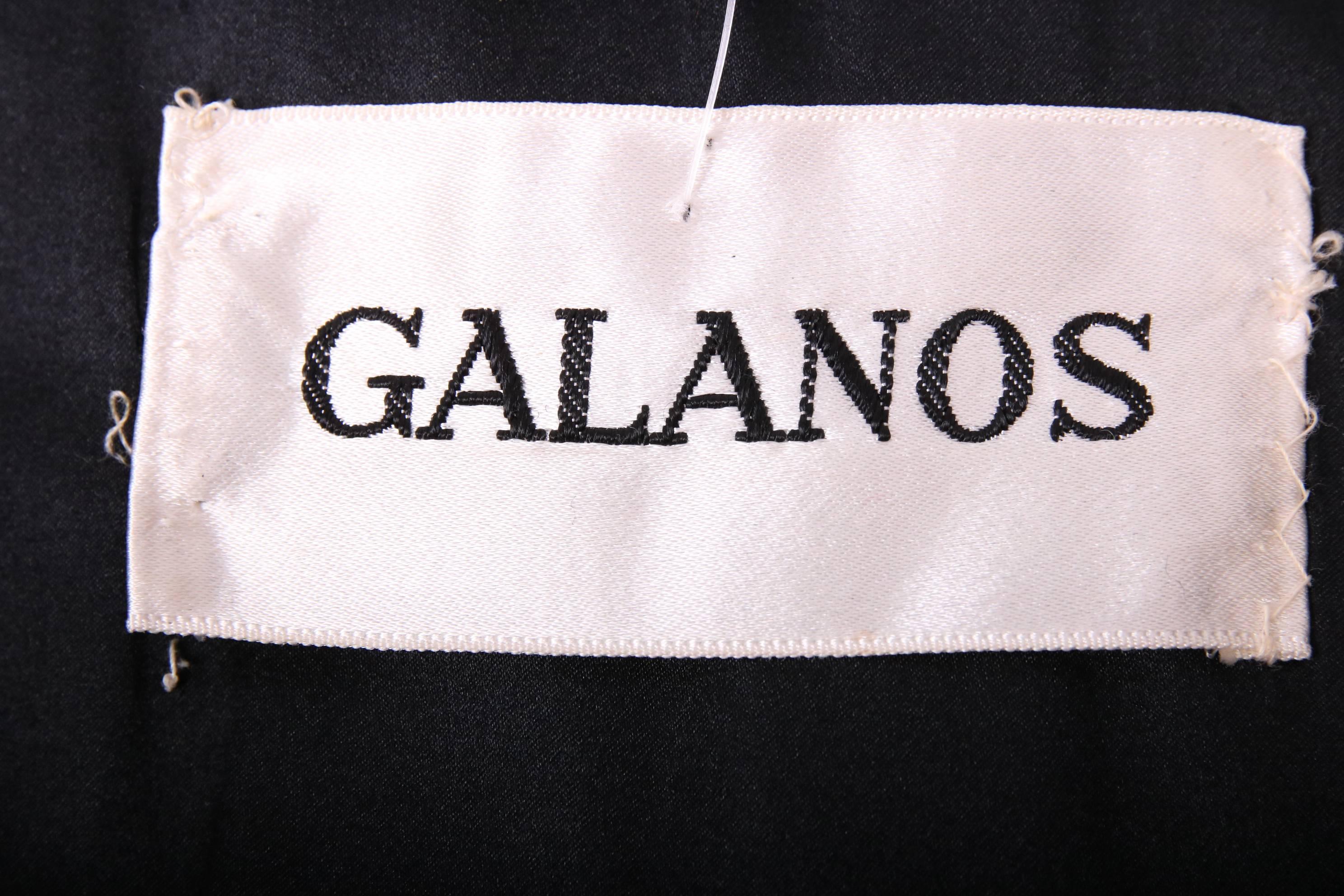 Vintage Galanos black melton wool cape with quilted detail at neckline and button closure also at neck. Cape hangs straight off the shoulder with no pockets or armholes. In excellent condition. No size tag - will fit a wide range of sizes.