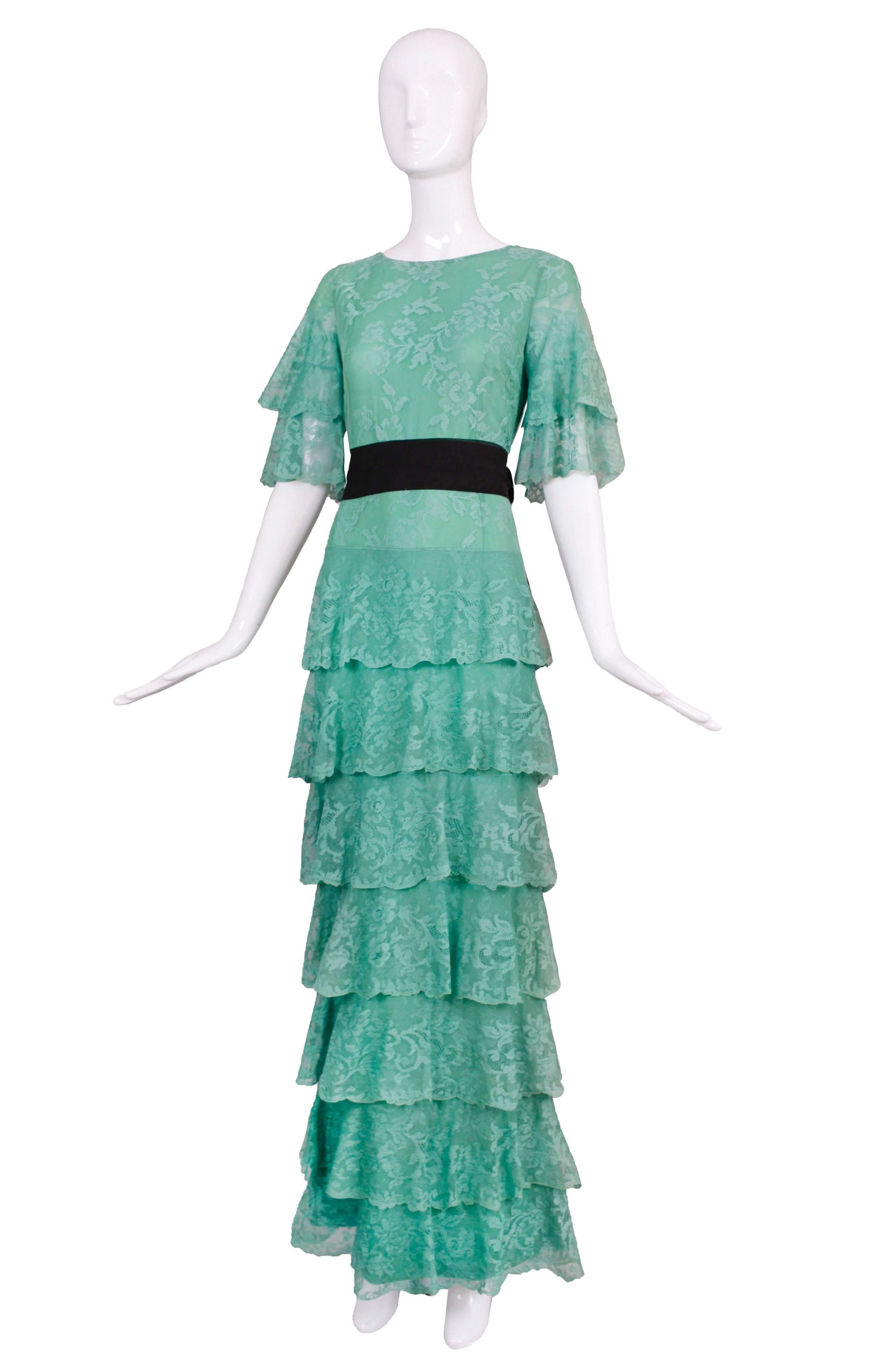 Pierre Cardin haute couture seafood green tiered lace evening gown. Lined at the interior with chiffon, does not come with belt. In excellent condition with a hidden rectangular mark at the interior bottom hem. No size tag so please consult