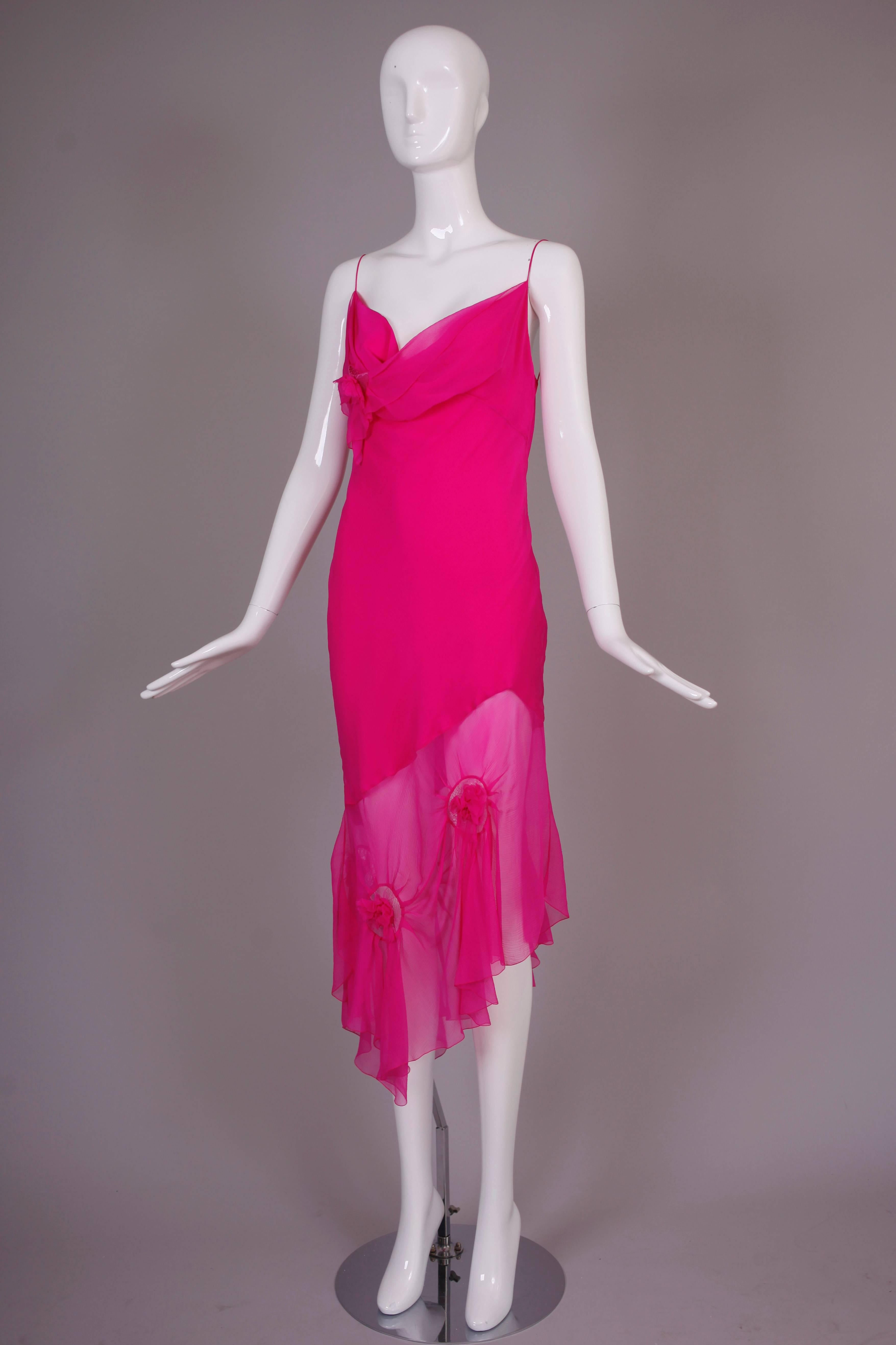 Circa 2000 John Galliano for Christian Dior shocking pink silk chiffon draped cocktail dress w/ puckered rosettes at the hem. In excellent condition. Size tag 8 - please see measurements.
MEASUREMENTS:
Bust - (approx.) 34