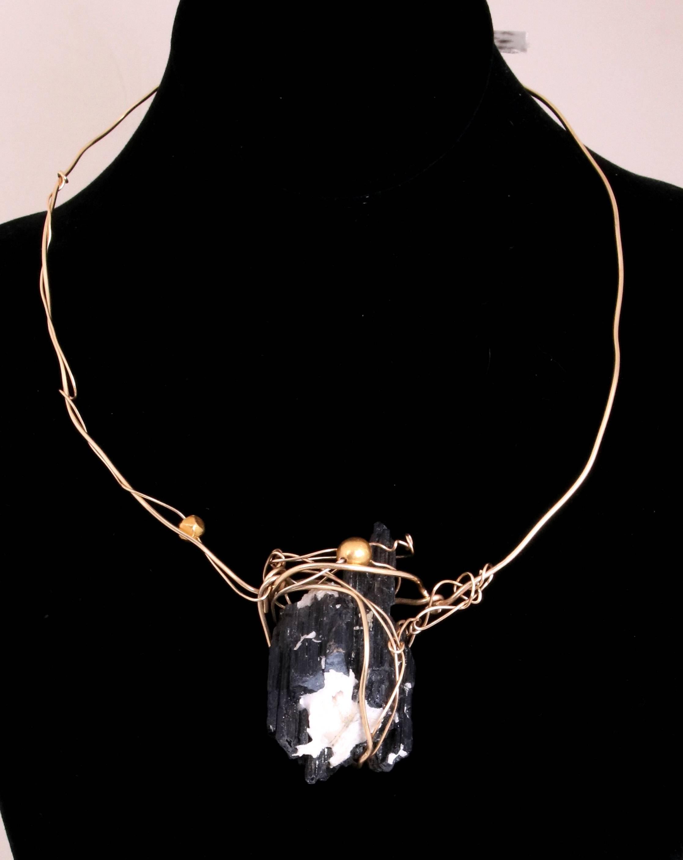 Kazuko 14k gold wire wrapped black tourmaline and quartz crystal necklace with two gold toned beads. Necklace is signed in black marker on white ribbon, 
