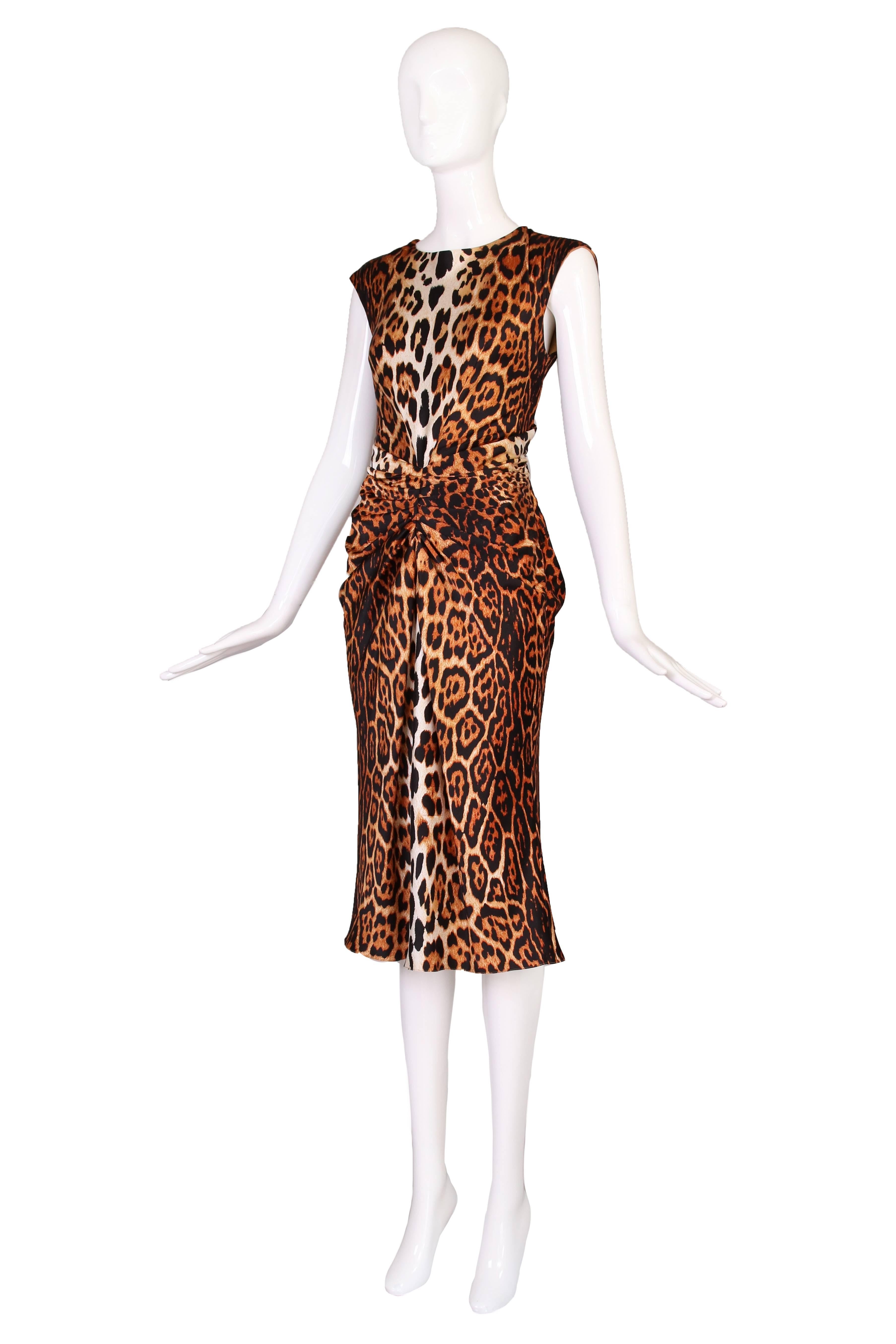 2008 A/H John Galliano era Christian Dior silk leopard print sleeveless dress with diagonal ruching at the waist. Size 8.
MEASUREMENTS:
Bust - 40