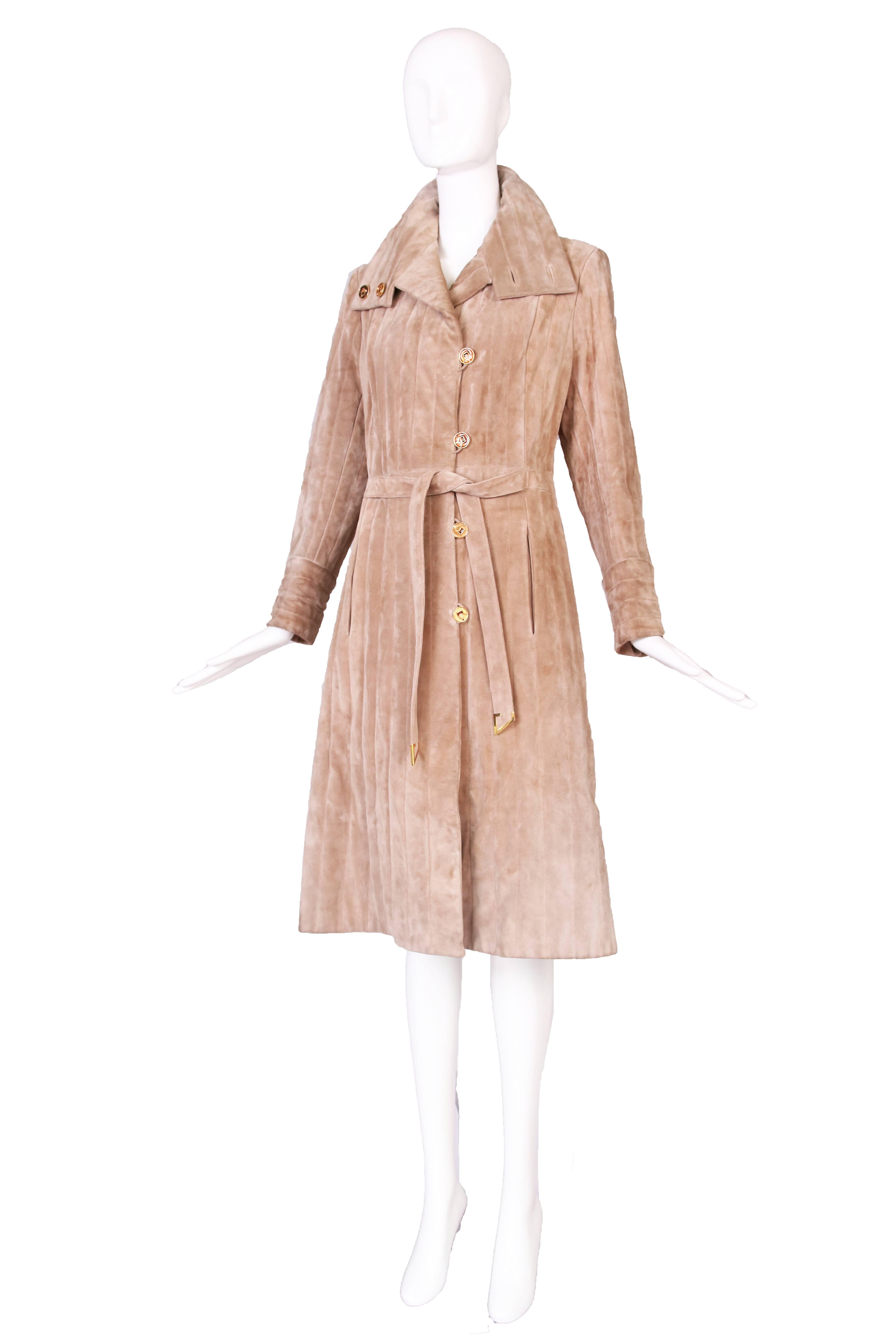 1970's Gucci quilted tan suede coat with signature glazed buttons and gold hardware in the shape of a 