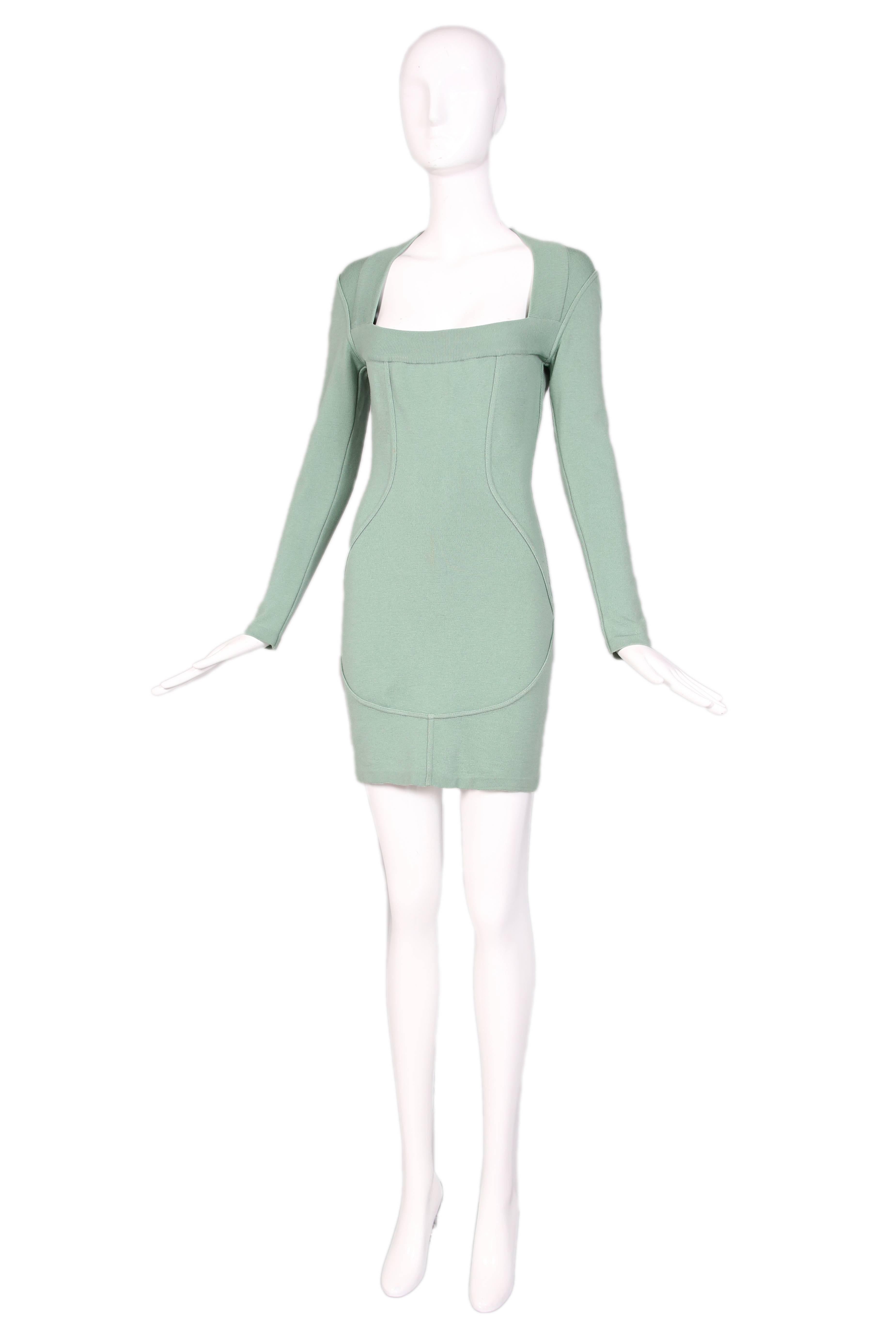 Vintage Alaia pale sage green long sleeved bodycon mini dress in a wool blend fabric. In excellent condition with a very small area of wear to the fabric on the underside of the left sleeve. Size XS.
MEASUREMENTS:
Bust - 32