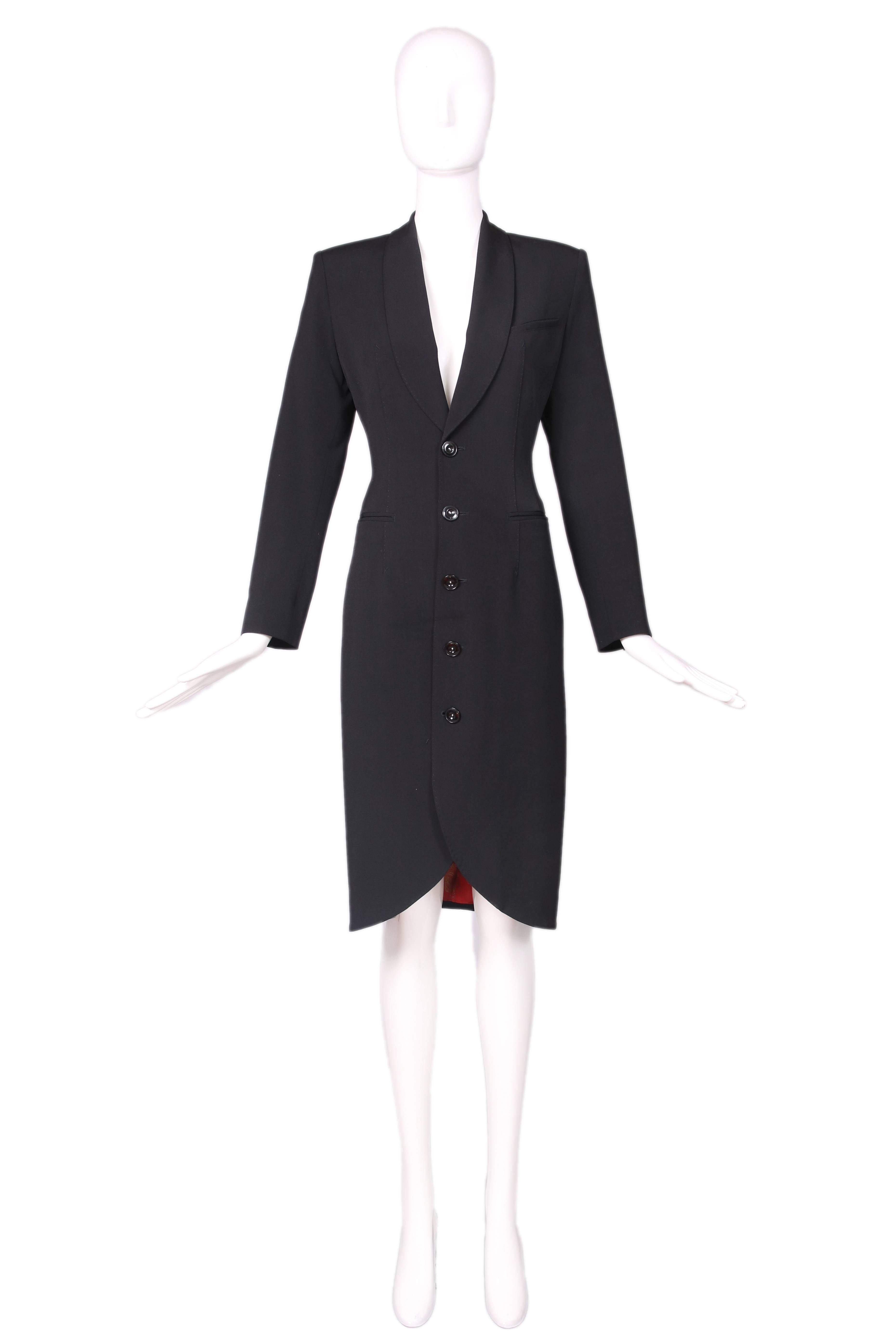 Vintage Jean Paul Gaultier black wool tuxedo dress/coat. In excellent condition. Size US 6.
MEASUREMENTS:
Bust - 32