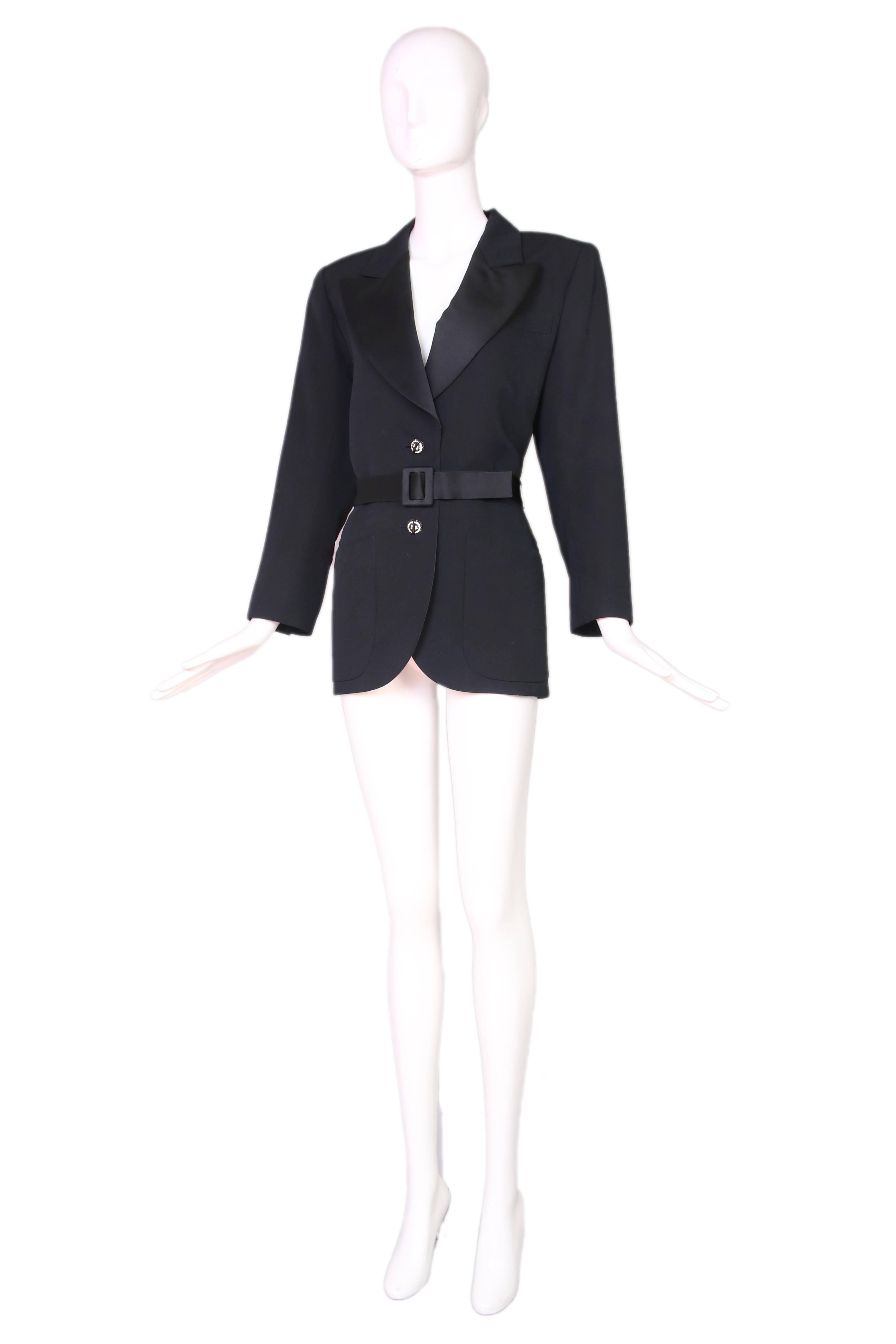 1970's Yves Saint Laurent black "Le Smoking" jacket with satin trim & belt. In excellent condition - missing one button at the sleeve. Size EU 36.
MEASUREMENTS:
Bust - 36"
Waist - 32"
Hips - 40"
Length - 30"