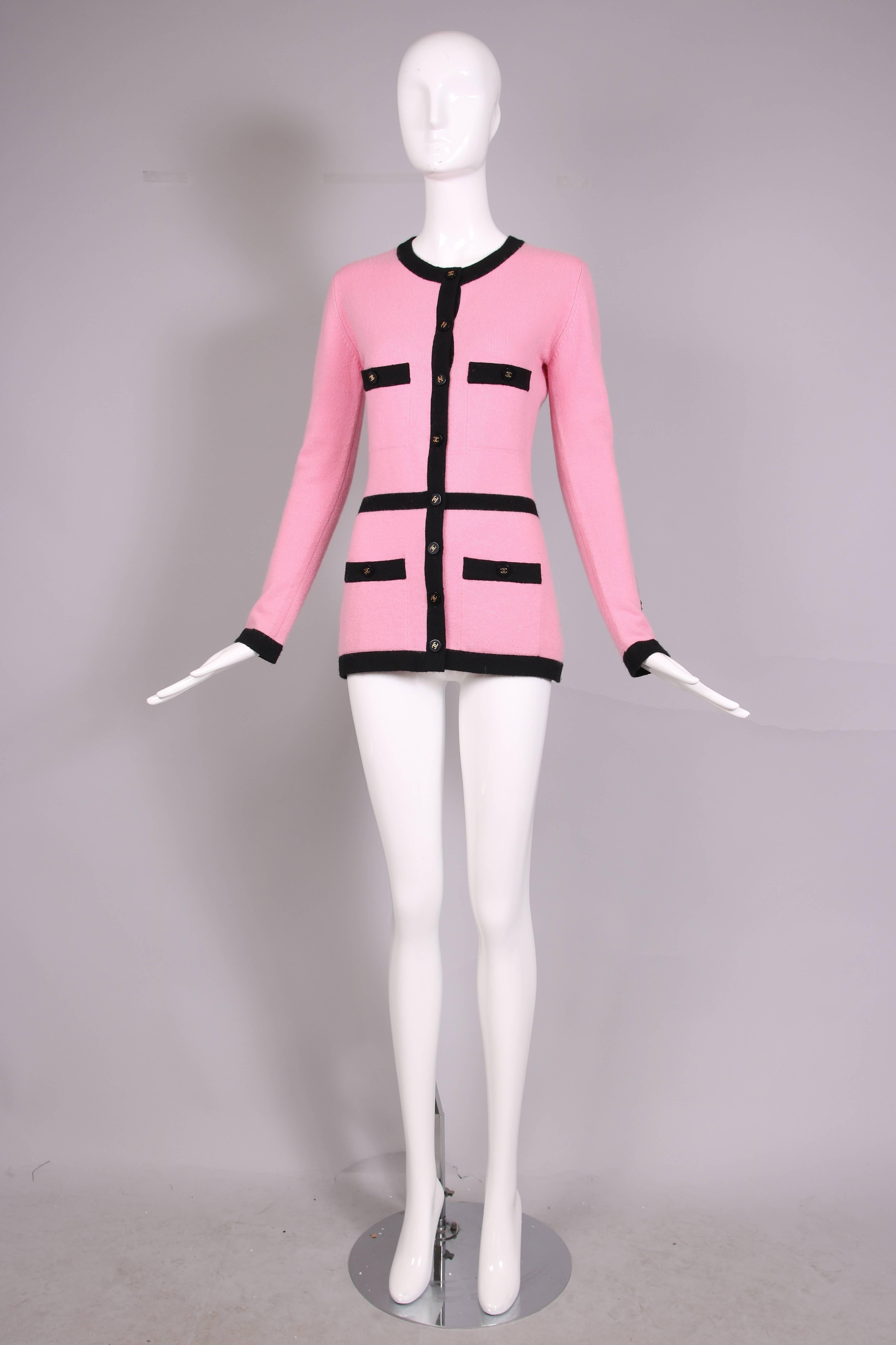 pink and black cardigan