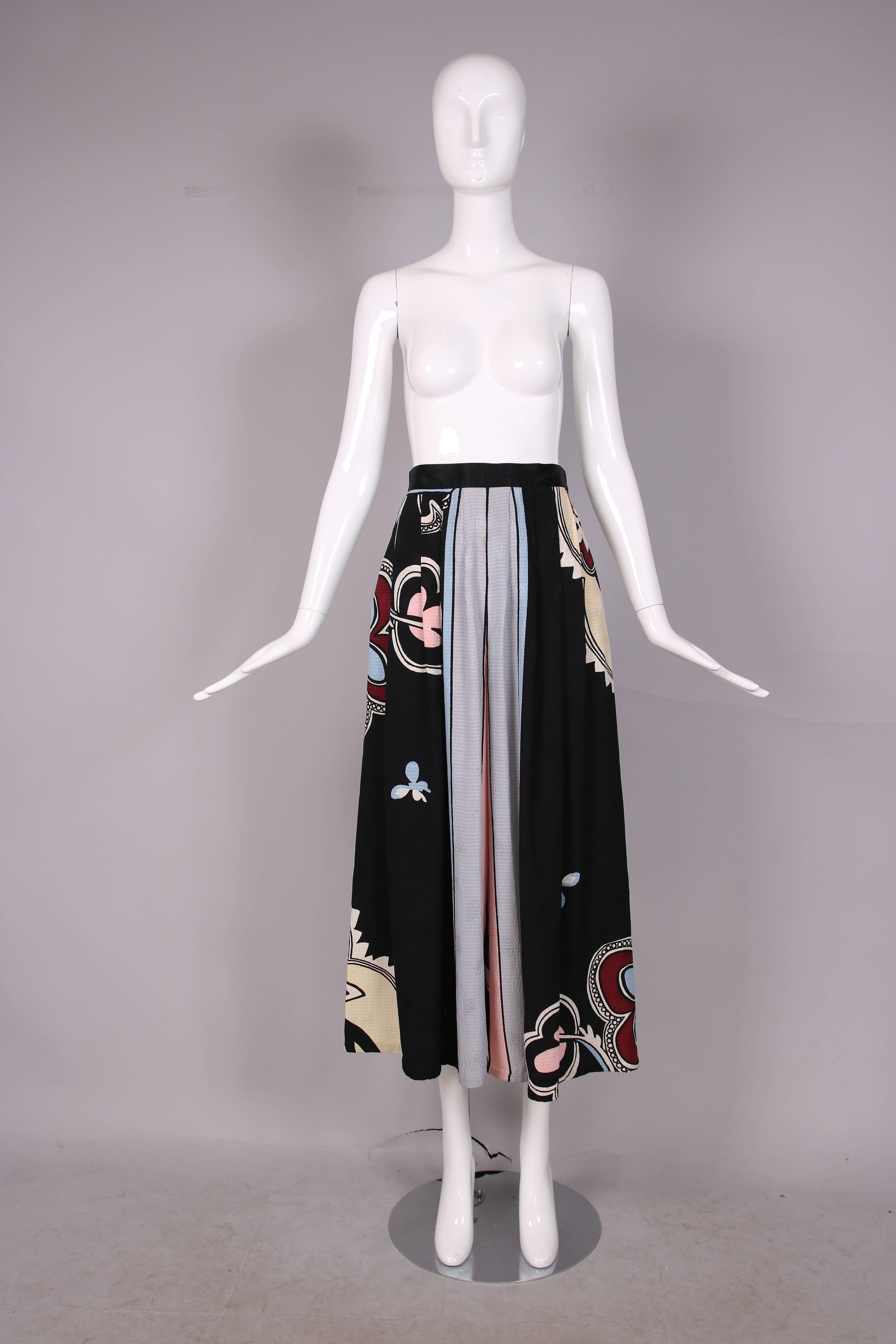 Vintage Michaele Vollbracht abstract floral printed silk palazzo pants. In excellent condition. Please see measurements.
MEASUREMENTS:
Waist - 26"
Hip - Free
Length - 38"