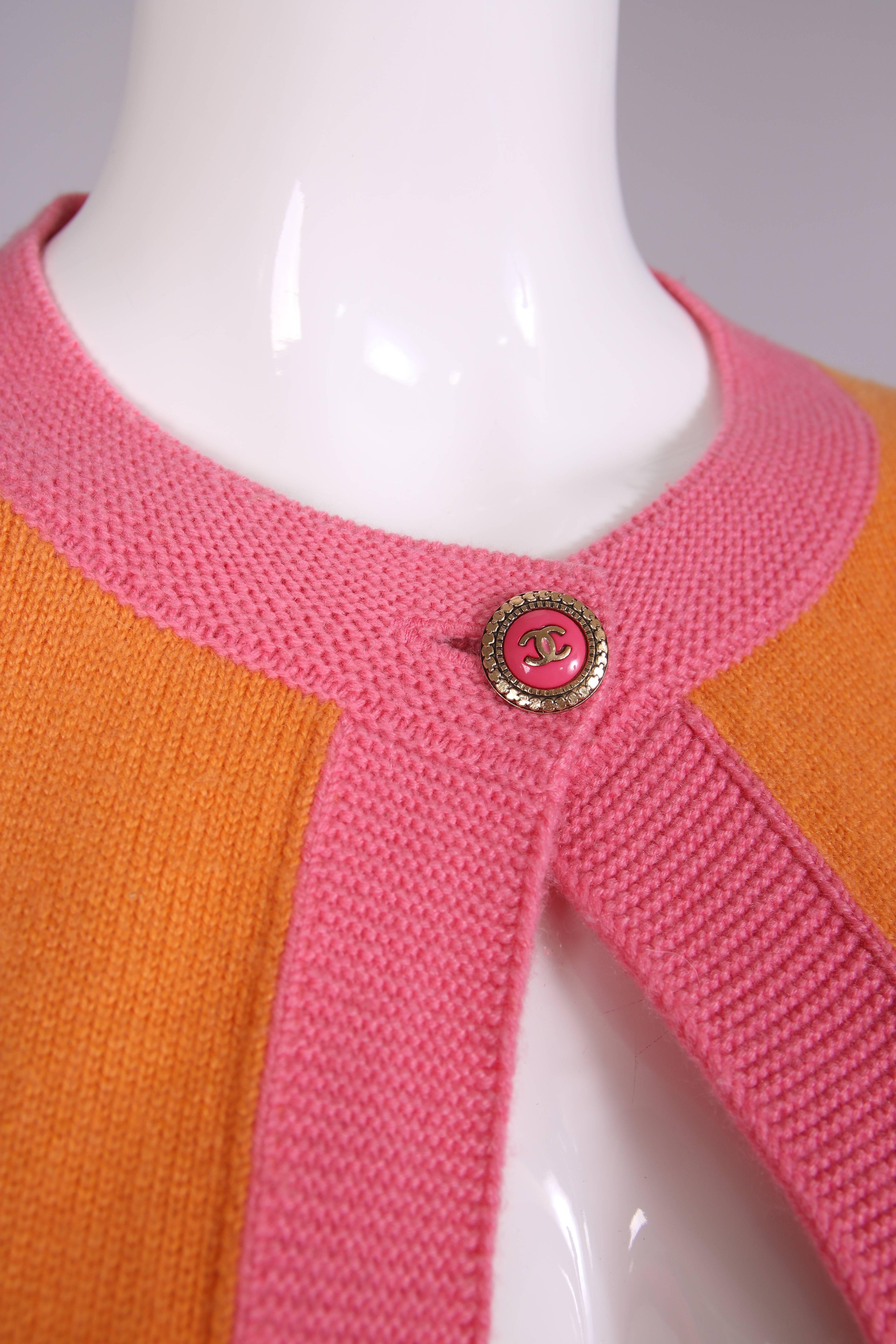 Women's 2007 Chanel Orange Cashmere Cardigan W/Chanel CC Logo Buttons & Pink Trim