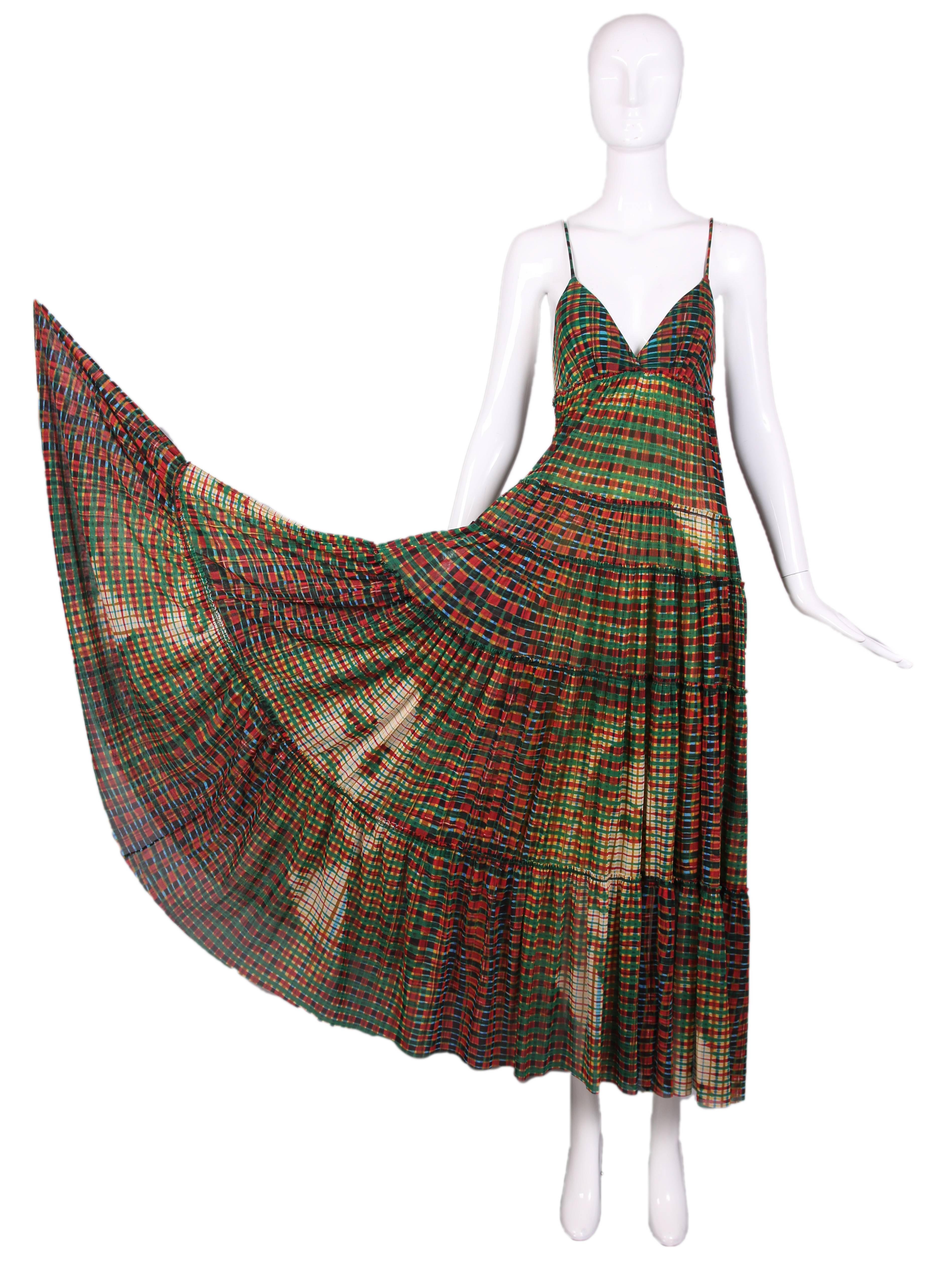 Vintage Jean-Paul Gaultier sheer mesh plaid multi-tiered, spaghetti strap, maxi dress with print of digital faces. In excellent condition. Size EU M.
MEASUREMENTS:
Bust - 32