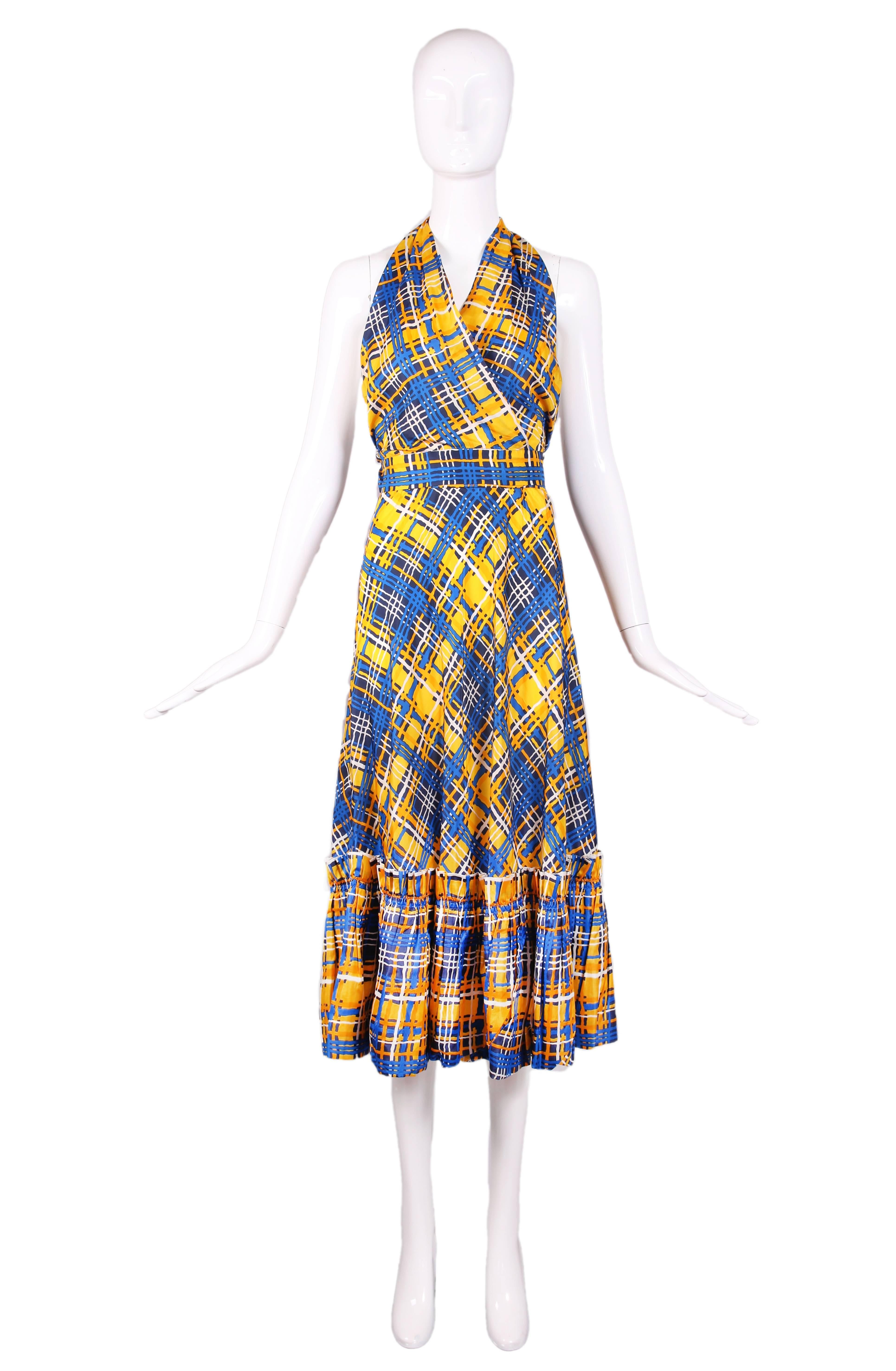 Ca. 1980 Yves Saint Laurent yellow, blue, and white plaid silk taffeta ensemble with prairie skirt and halter top. Halter has a shiny blue ring at back neck and adjustable wrap ties around the waist. In excellent condition - both skirt & top appear