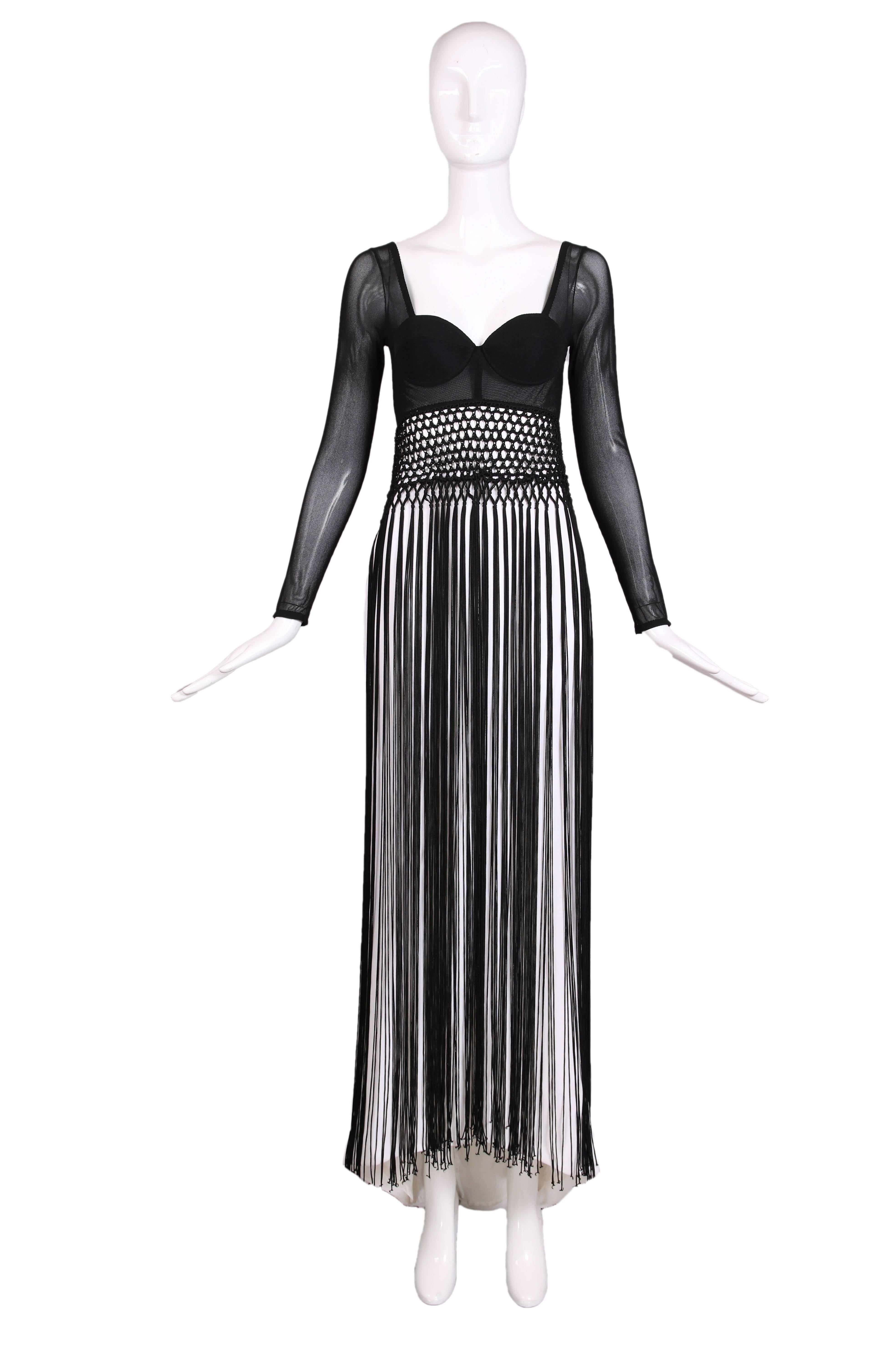 Ca. 1989/96 Unlabeled Christian Dior by Gianfranco Ferre black and white gown w/illusion bustier top and extra long fringe detail from waist to hem over a white skirt. Sweetheart shaped bustier top with illusion long sleeves and open back. Slightly