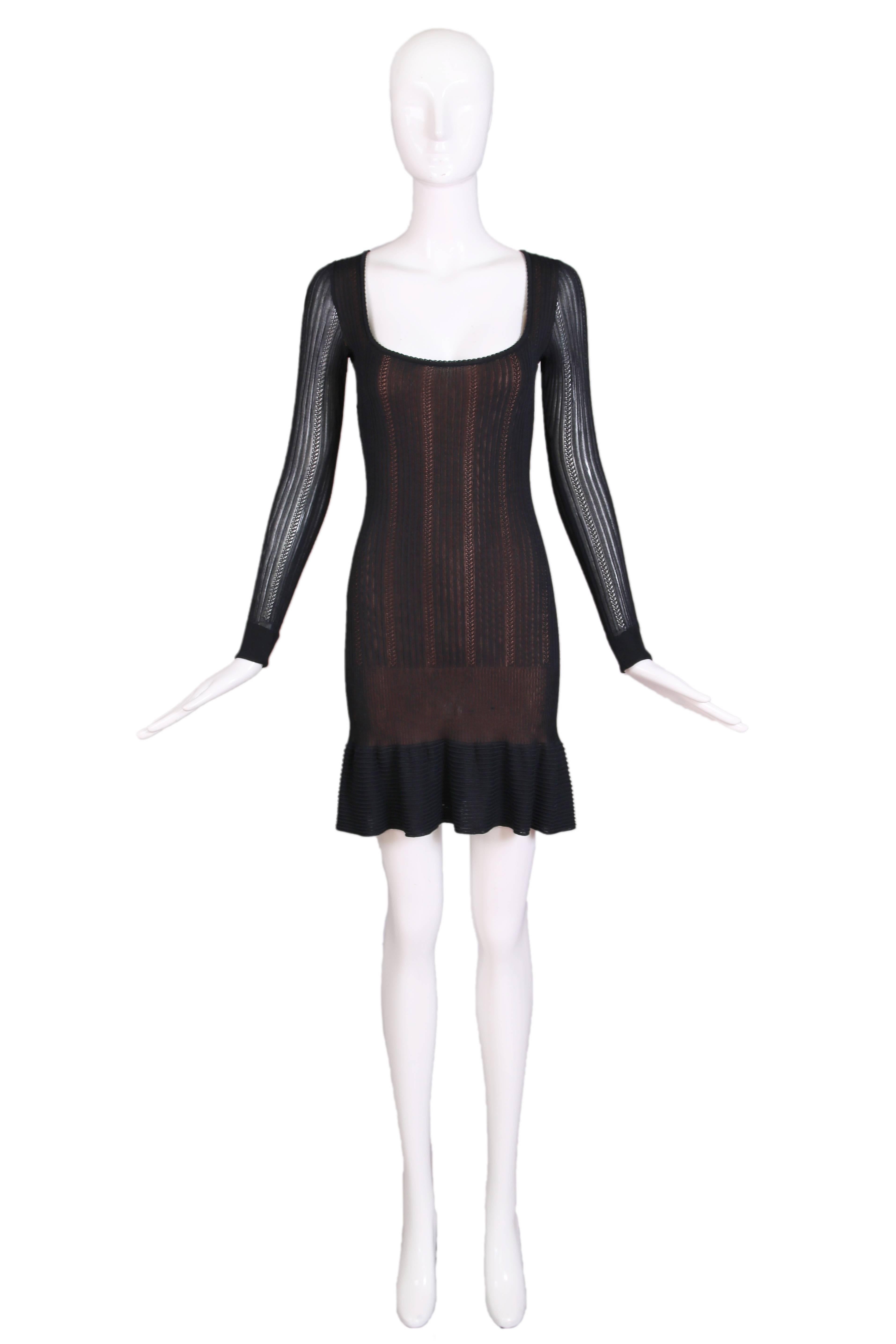 Vintage Azzedine Alaia black sheer stretch viscose long sleeved mini dress with scooped neck and flounced hem. Bodice has a nude-colored lining. In excellent condition. No size tag, please consult measurements.
MEASUREMENTS:
Bust - 32"
Waist -