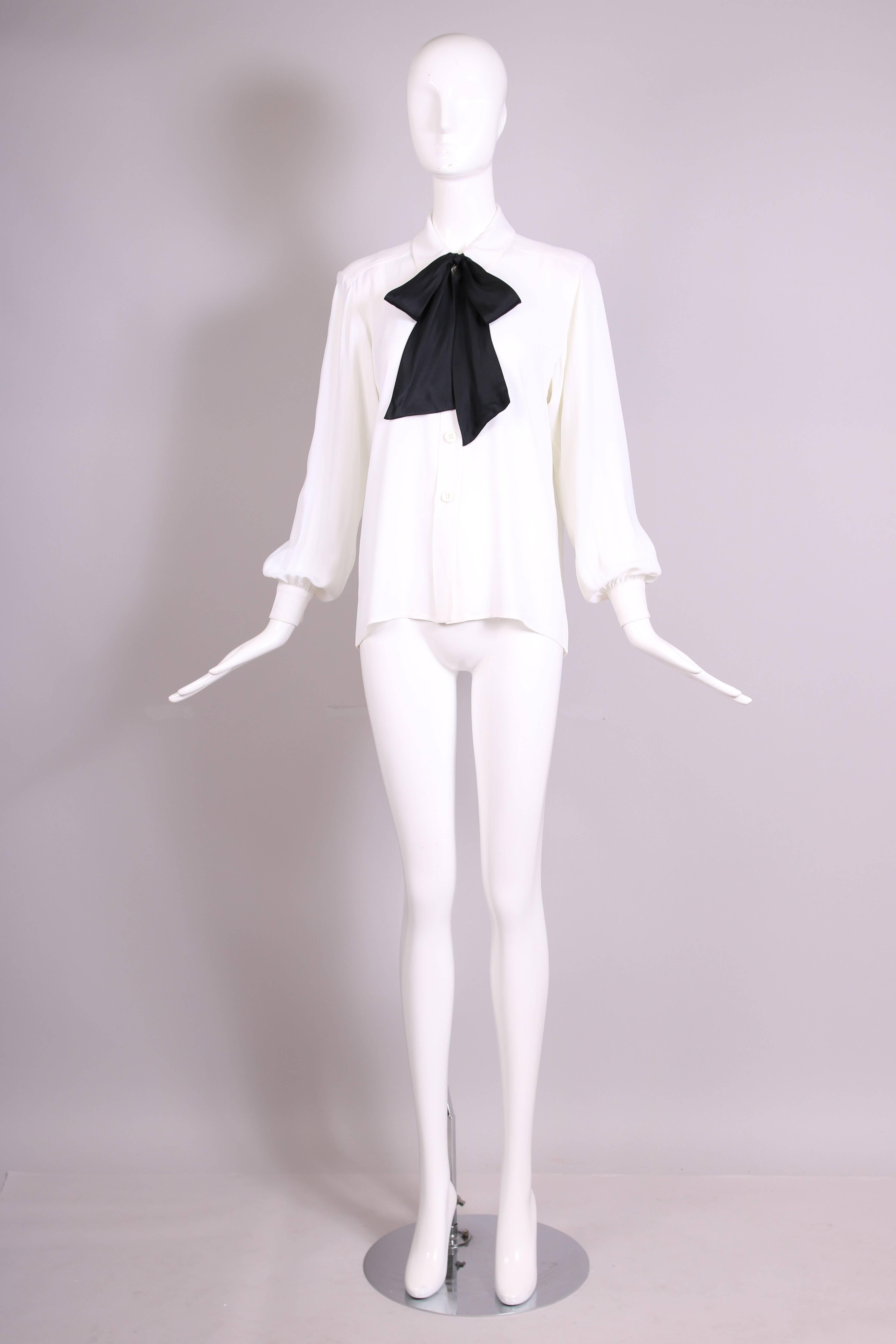 white blouse with black bow