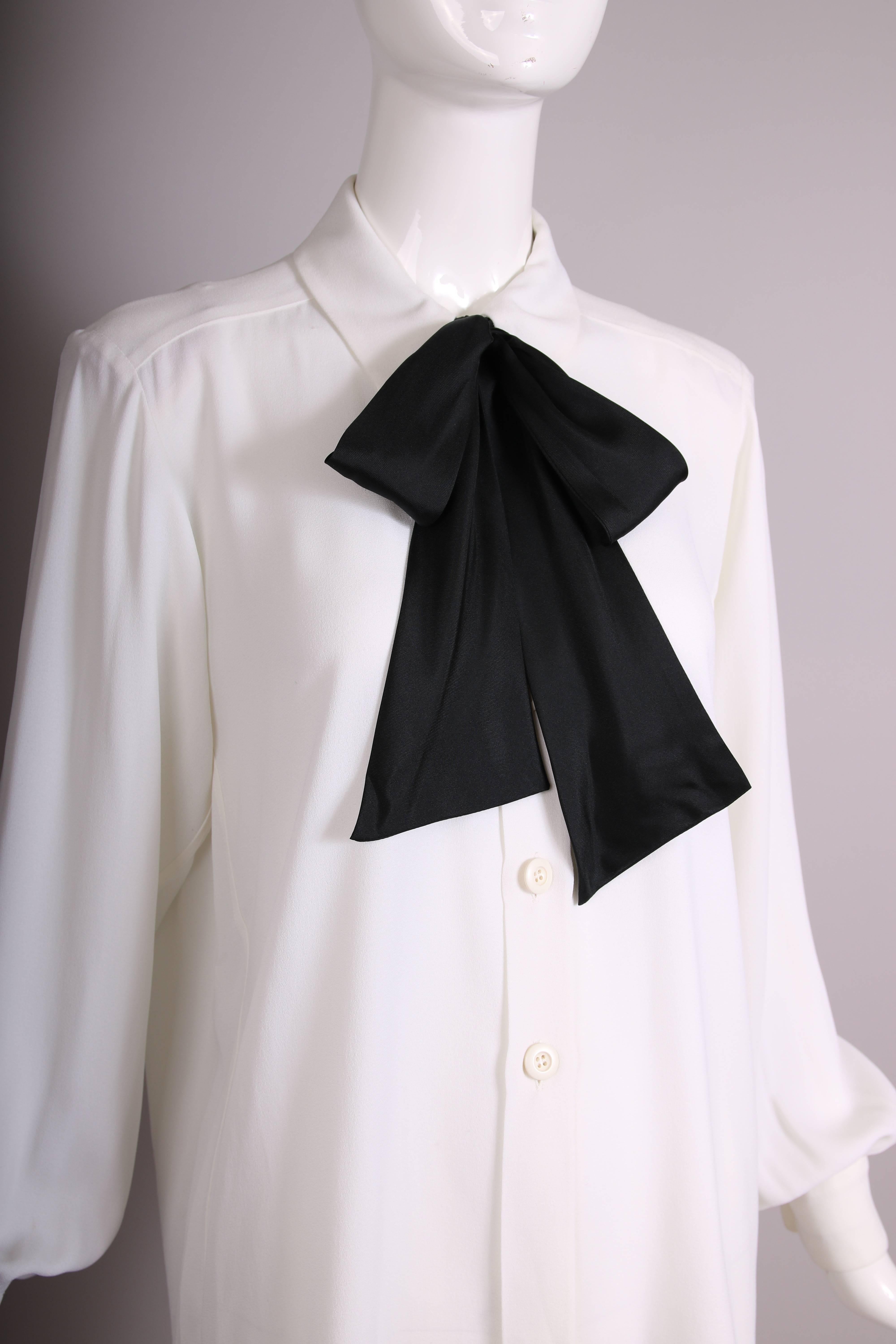 white shirt with black bow
