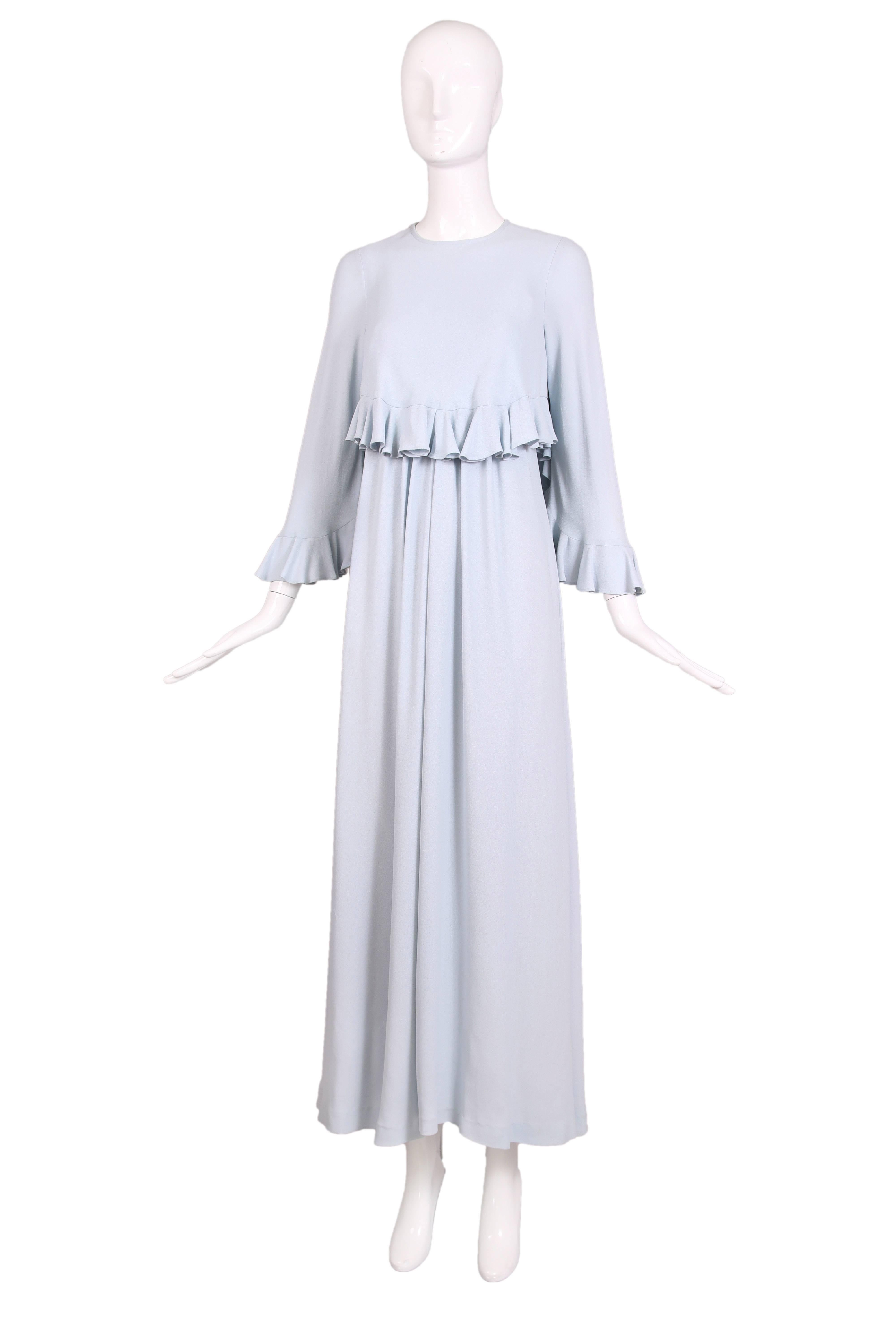 1970's Gina Fratini pale blue moss crepe maxi dress with gathered front and matching ruffled trim capelet with neck ties. In excellent condition. Size tag 8 but please consult measurements - these measurements are most consistent with a size