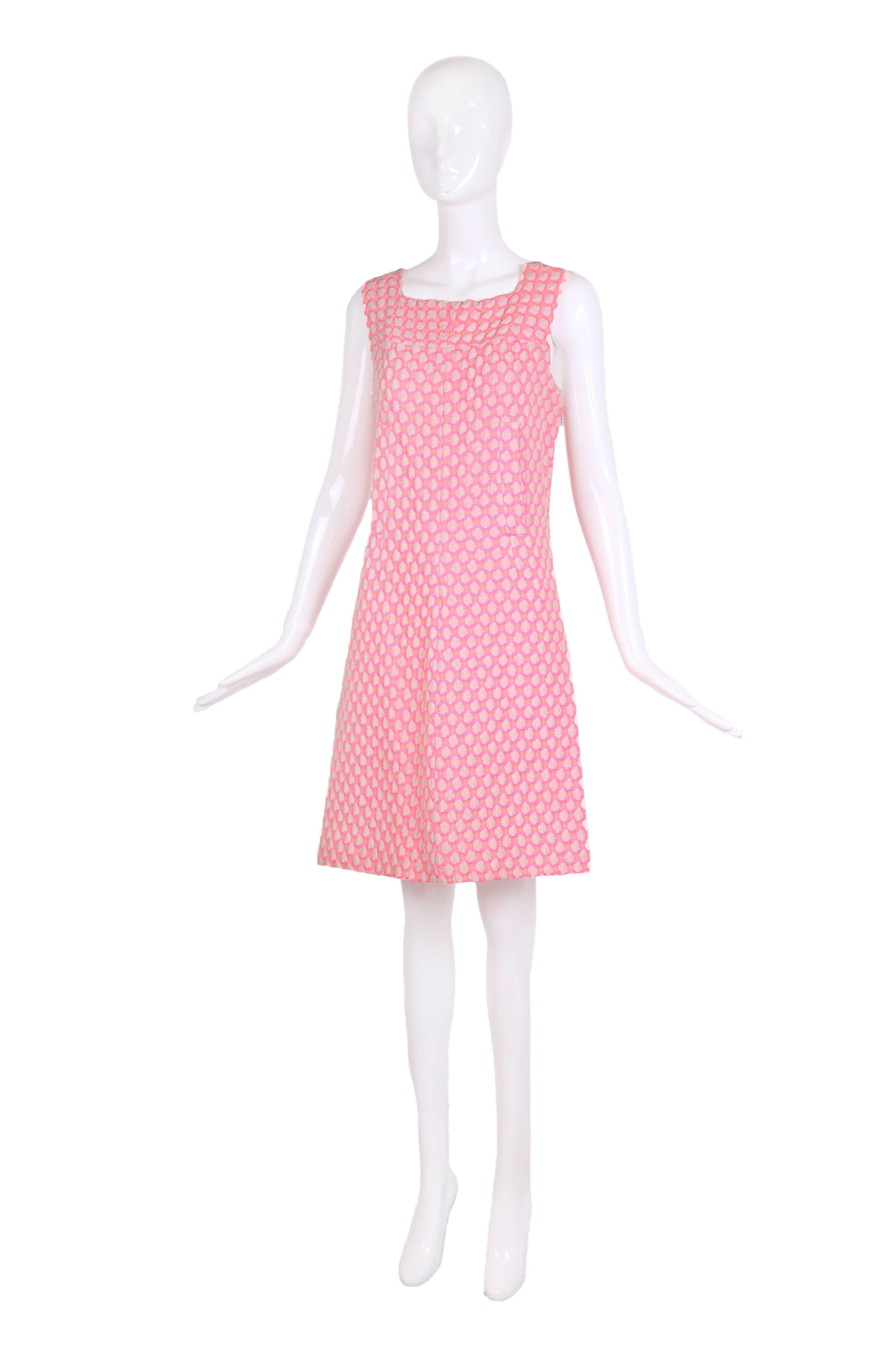 1960's Guy Laroche shift dress that was designed by Laroche but sewn and finished by French couturier Maria Carine. There is no fabric tag but the fabric appears to be a puckered cotton blend (the fabric has some stretch) and is patterned with