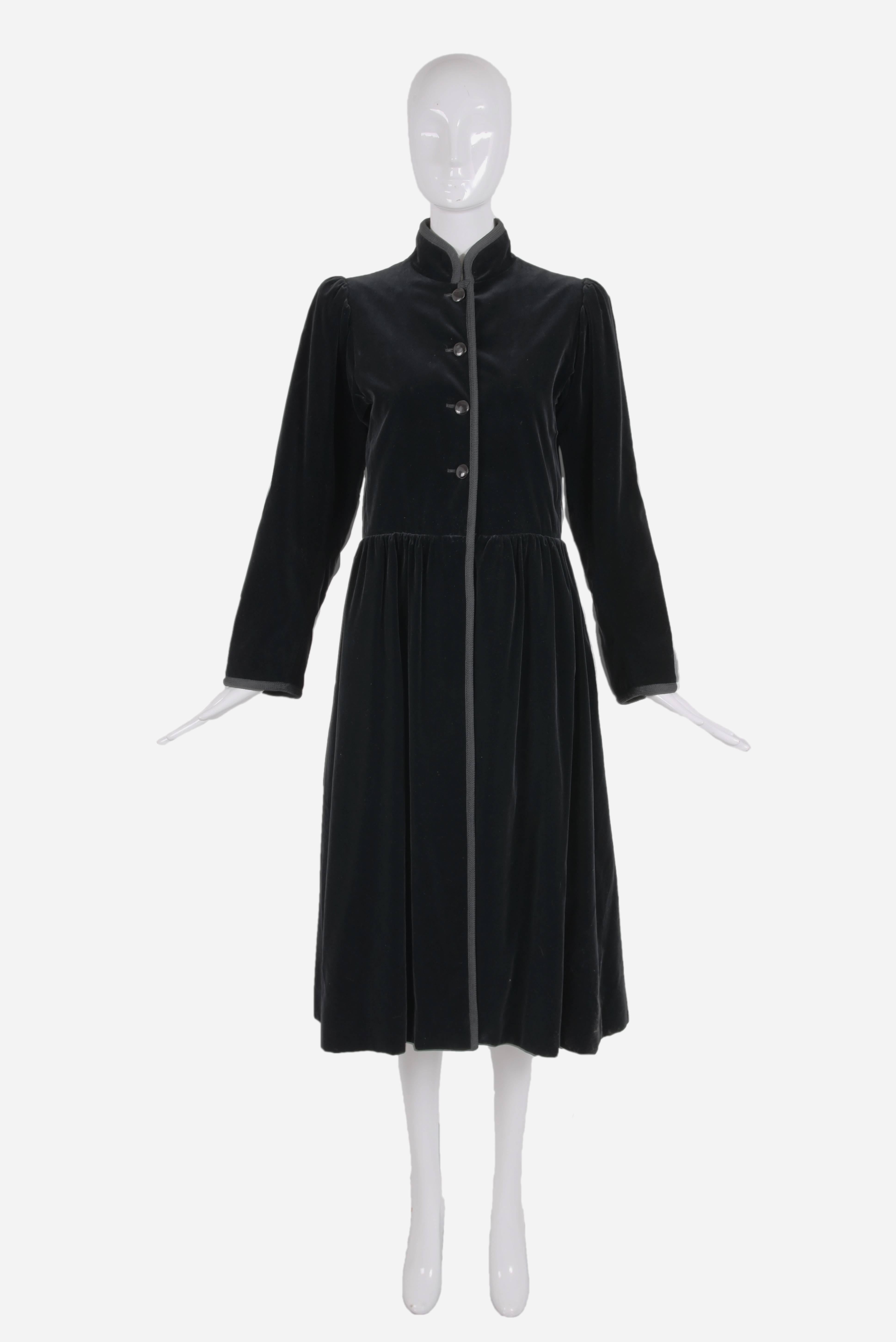 1976 Yves Saint Laurent Russian Collection black velvet coat with black cord trim, shiny black button closures at center front bodice, oversized puffed sleeves and with a slightly full/gathered 