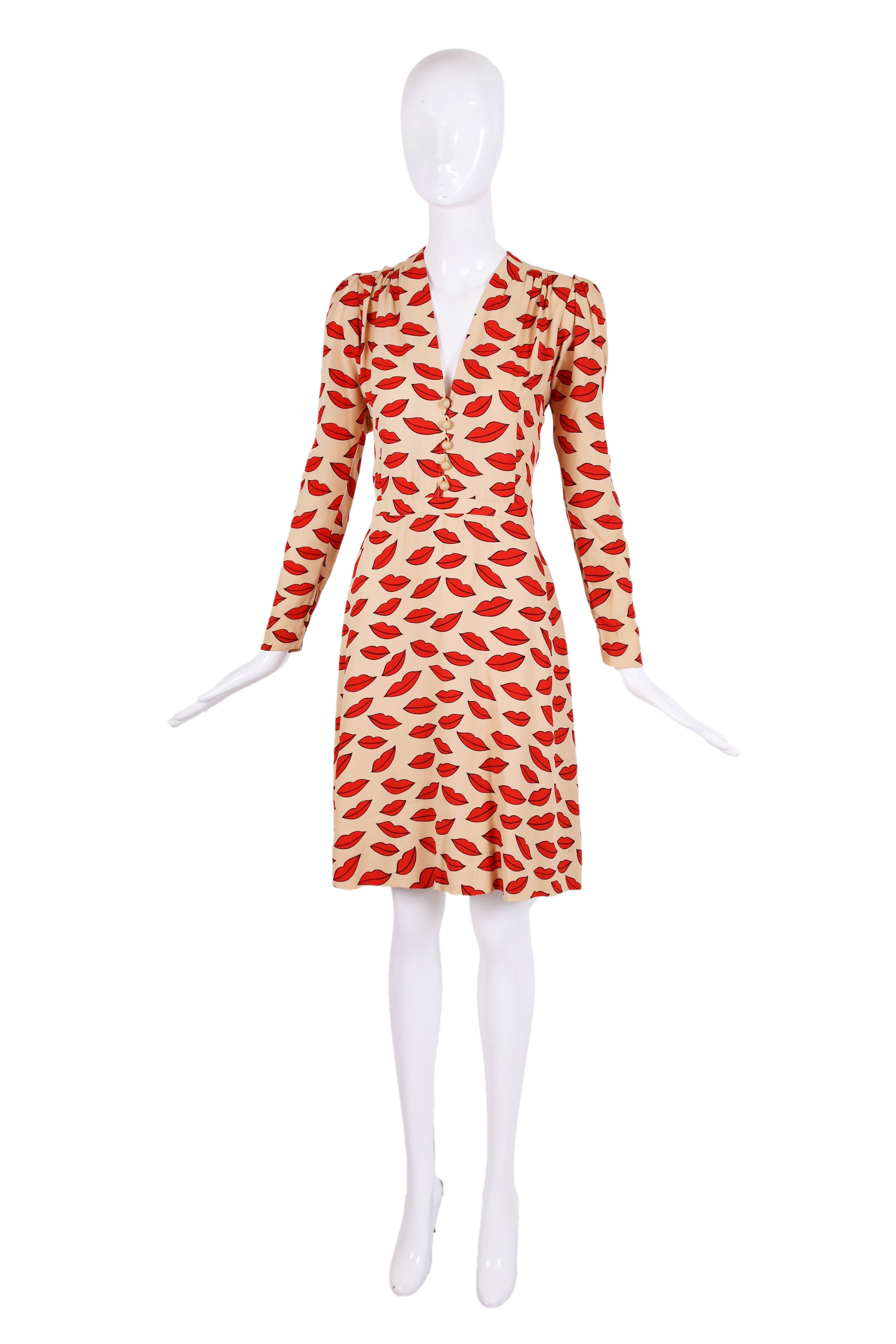 The celebrated 1971 Yves Saint Laurent lips print dress from the collection that was panned when it came out but now universally revered. We are so lucky to be offering this giant of a collector's piece - see original editorial amongst photographs.